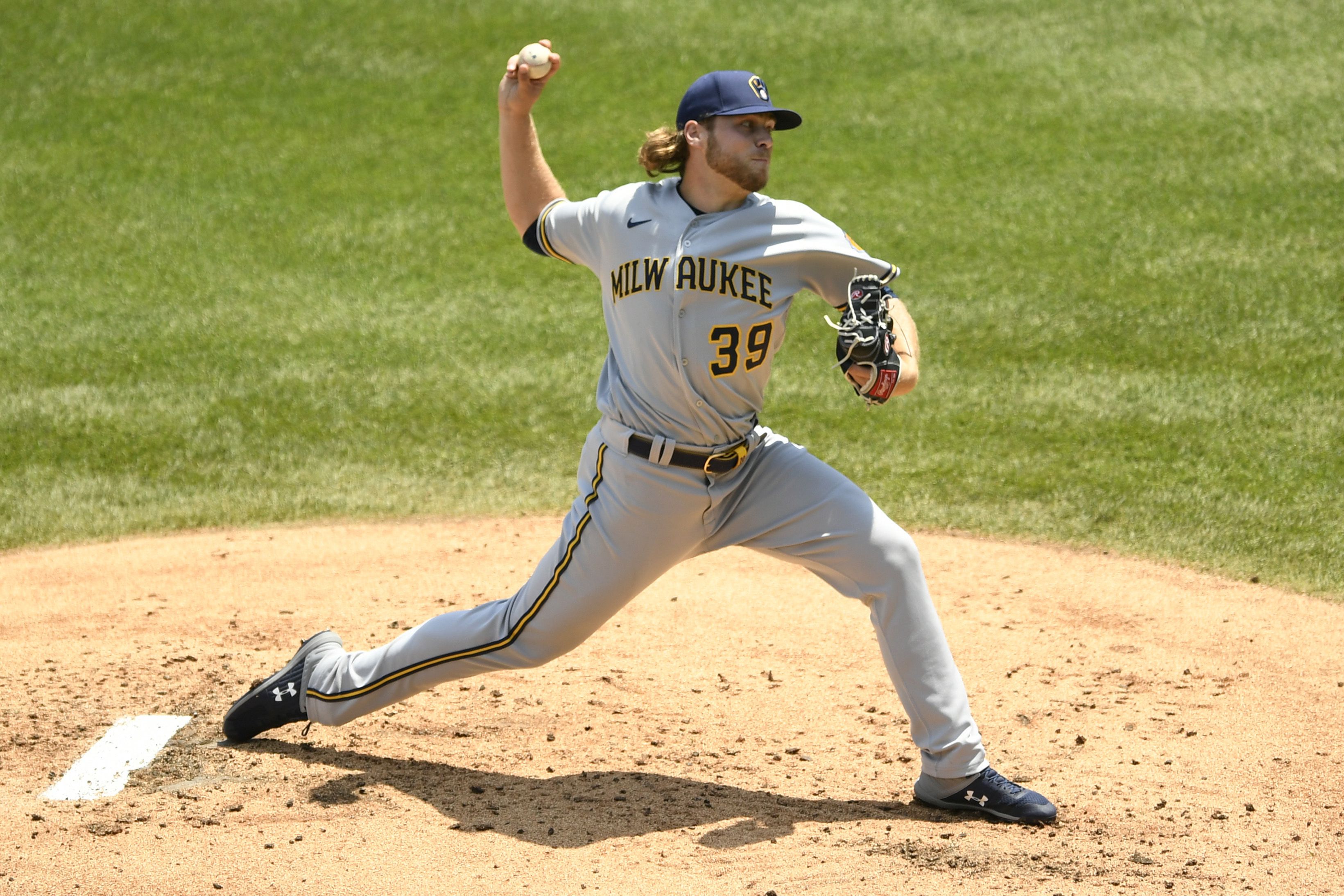 Luis Urias of the Milwaukee Brewers bats against the Chicago Cubs