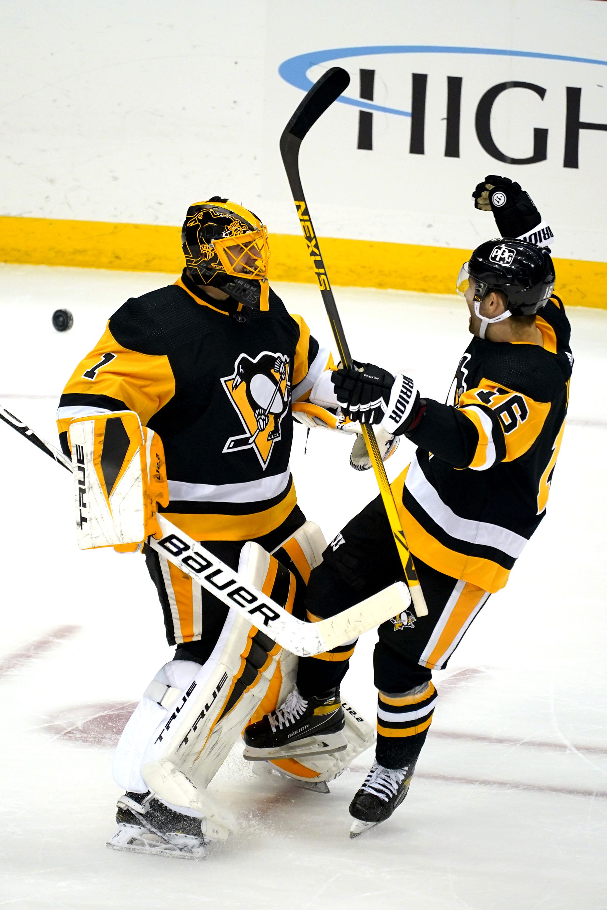 Pittsburgh Penguins' Jason Zucker (16) celebrates his goal with