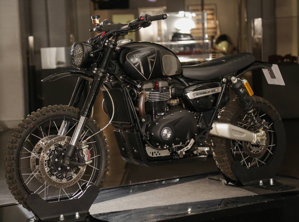 2-Triumph-Scrambler-1200-XE-action-vehicle-from-No-Time-To-Die-on-display-at-Bond-In-Motion-in-London-LR.jpg