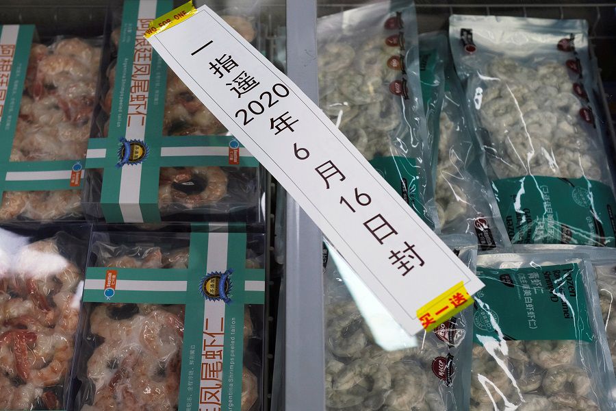 FILE PHOTO: Frozen seafood products made of imported shrimps are seen inside a sealed freezer at a supermarket in Beijing