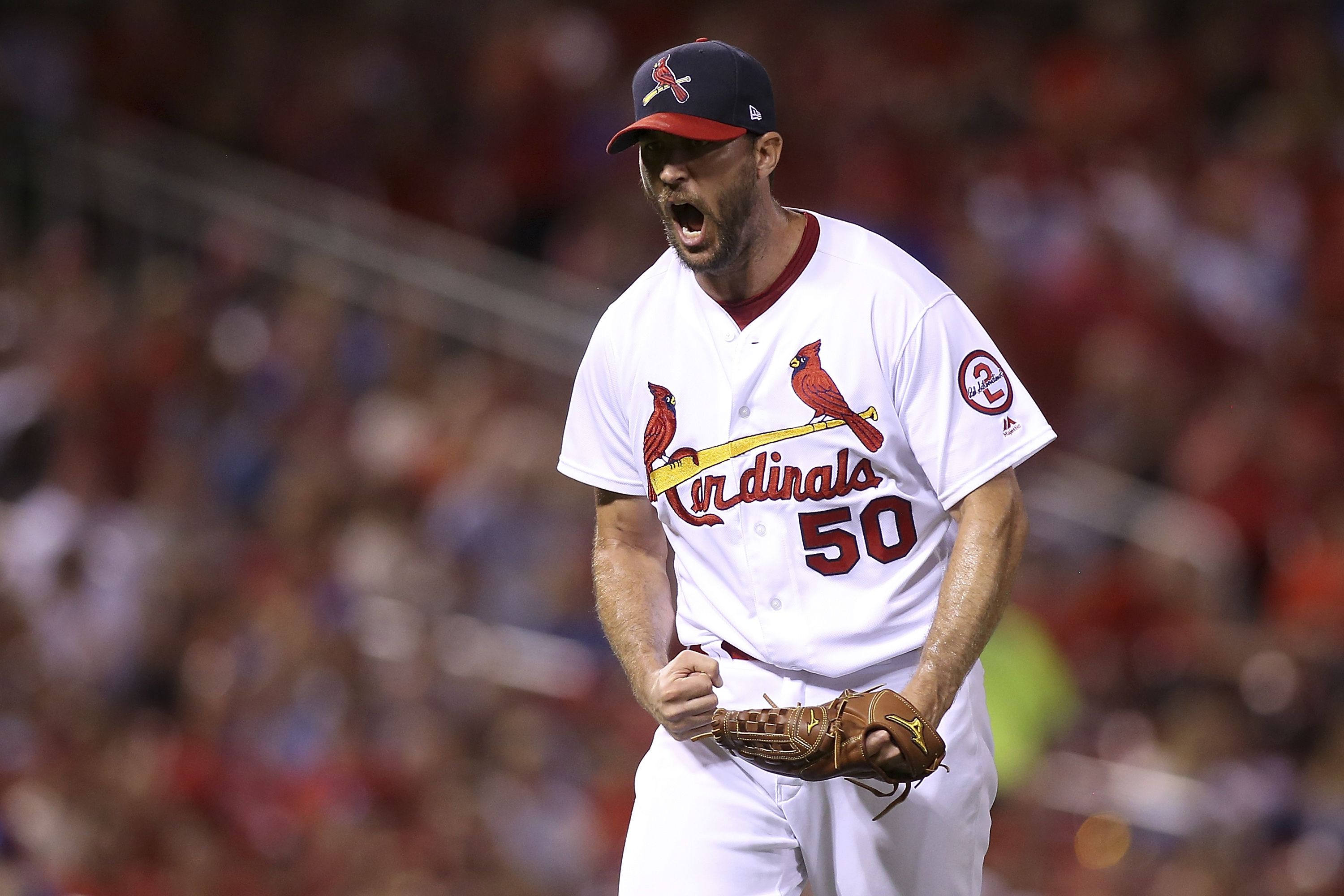 MILWAUKEE, WI - APRIL 14: St. Louis Cardinals starting pitcher Adam  Wainwright (50) waits for a sign during a game between the Milwaukee  Brewers and the St. Louis Cardinals at American Family