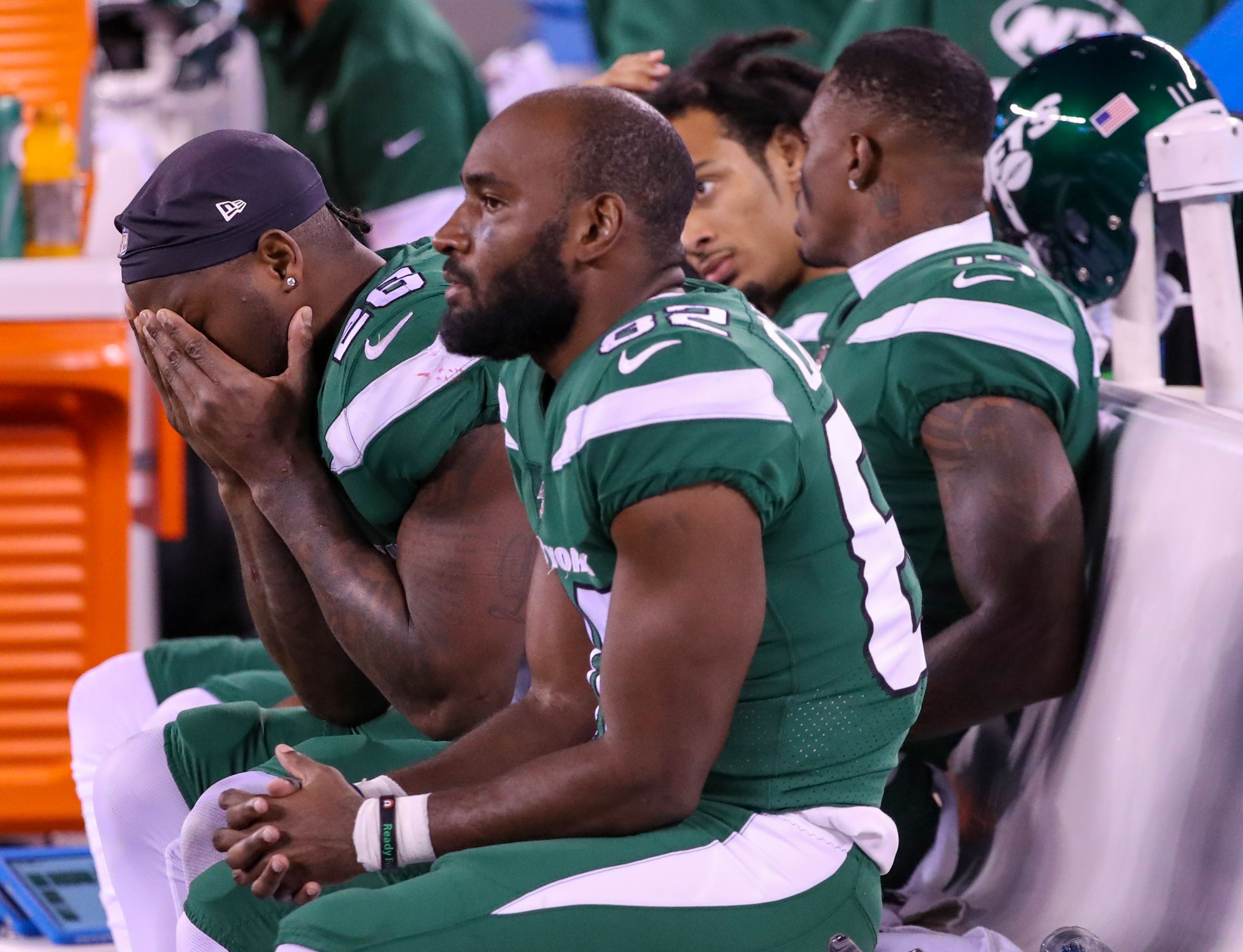 New York Jets Players in Locker Room Around Pool Table. 