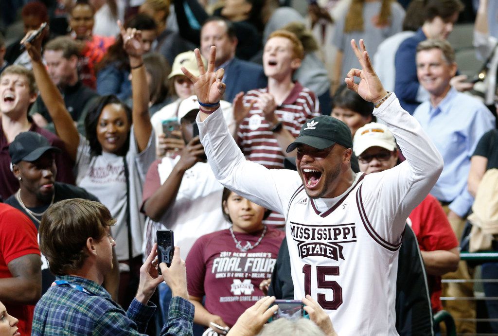 Dak Prescott Mississippi State Bulldogs Unsigned Maroon Jersey Touchdown  Celebration During Liberty Bowl Photograph