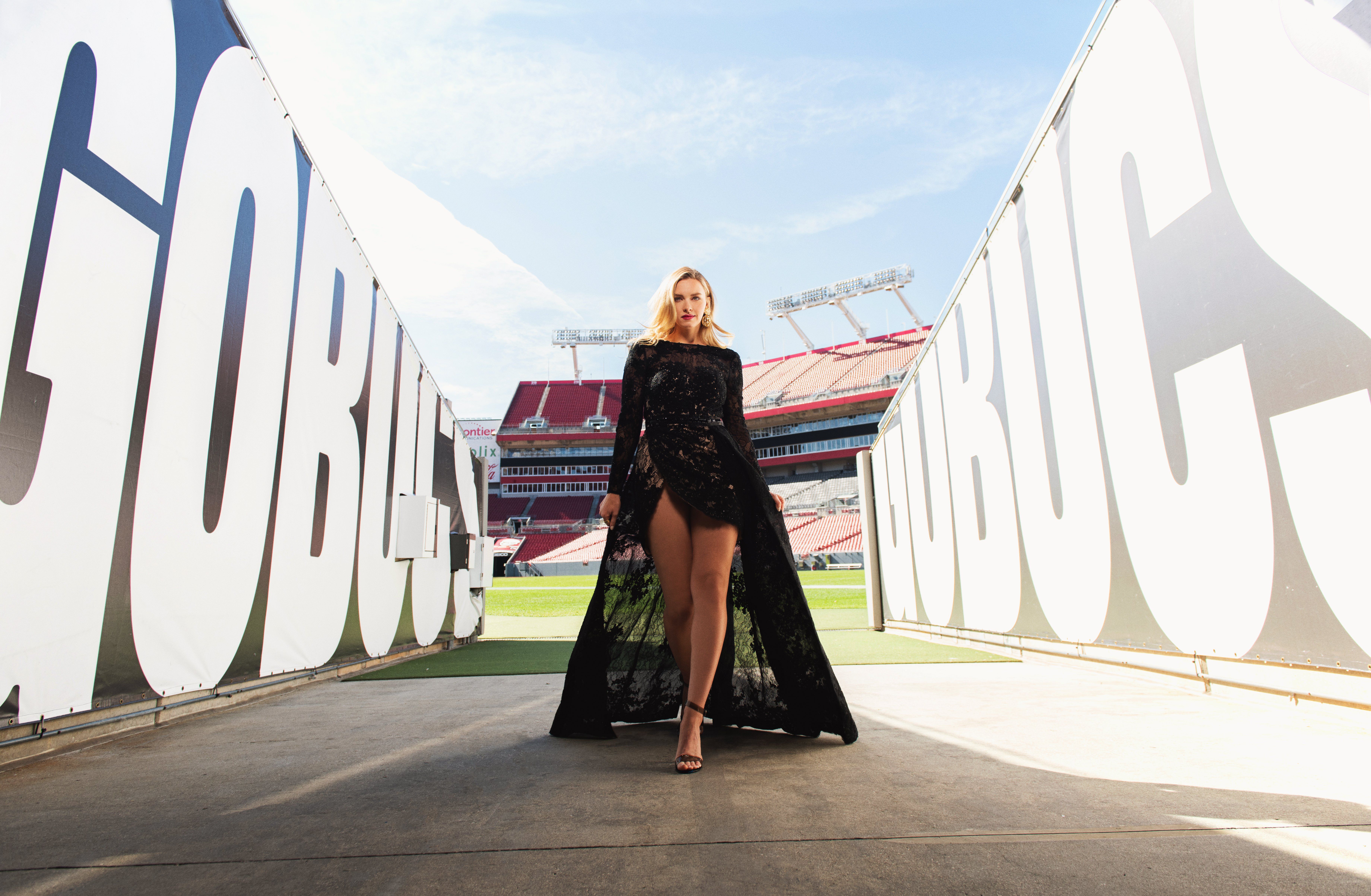 Camille Kostek models Bucs-inspired looks at Raymond James Stadium in Tampa