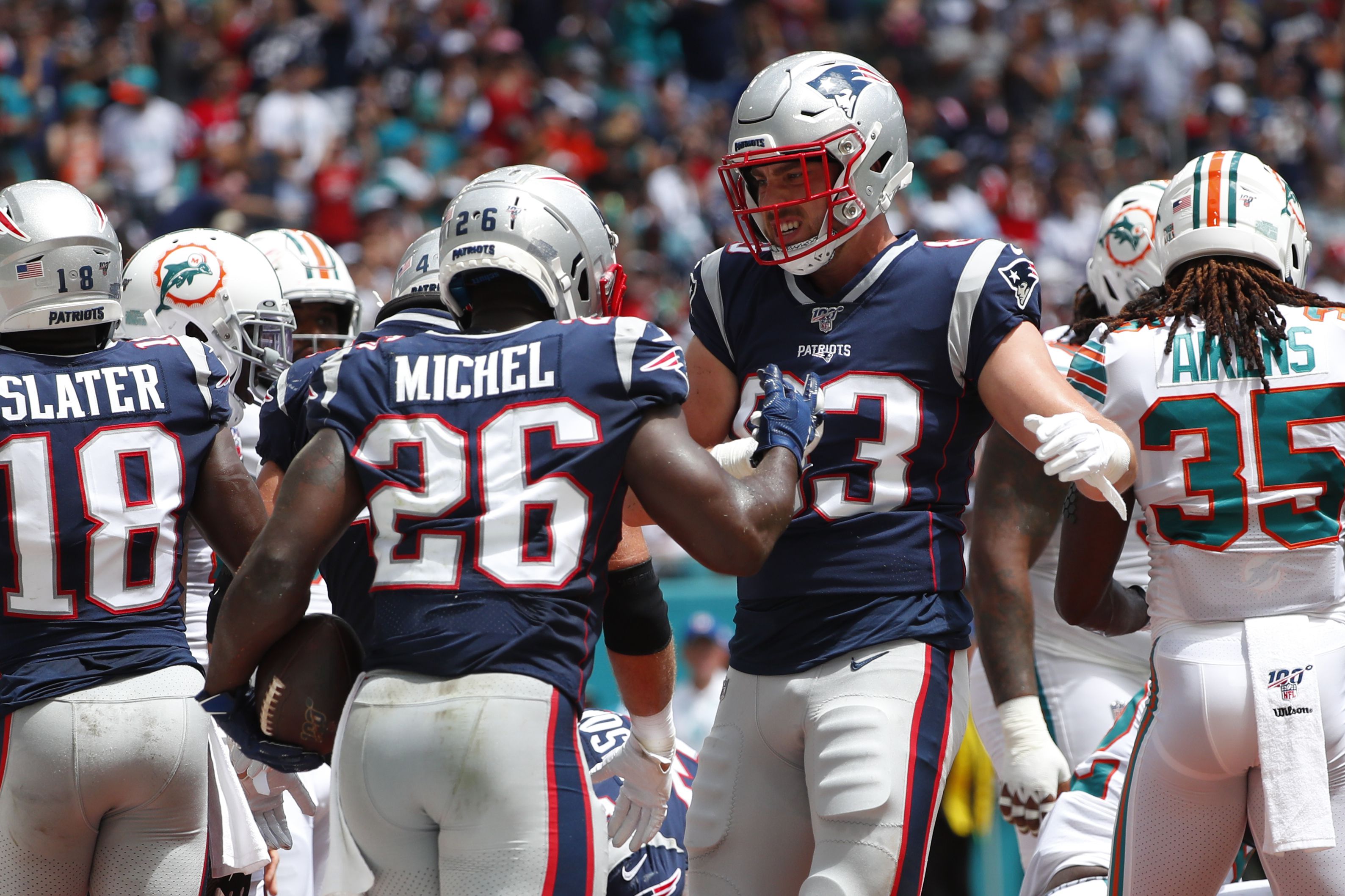 Miami Dolphins running back Sony Michel (28) is congratulated by