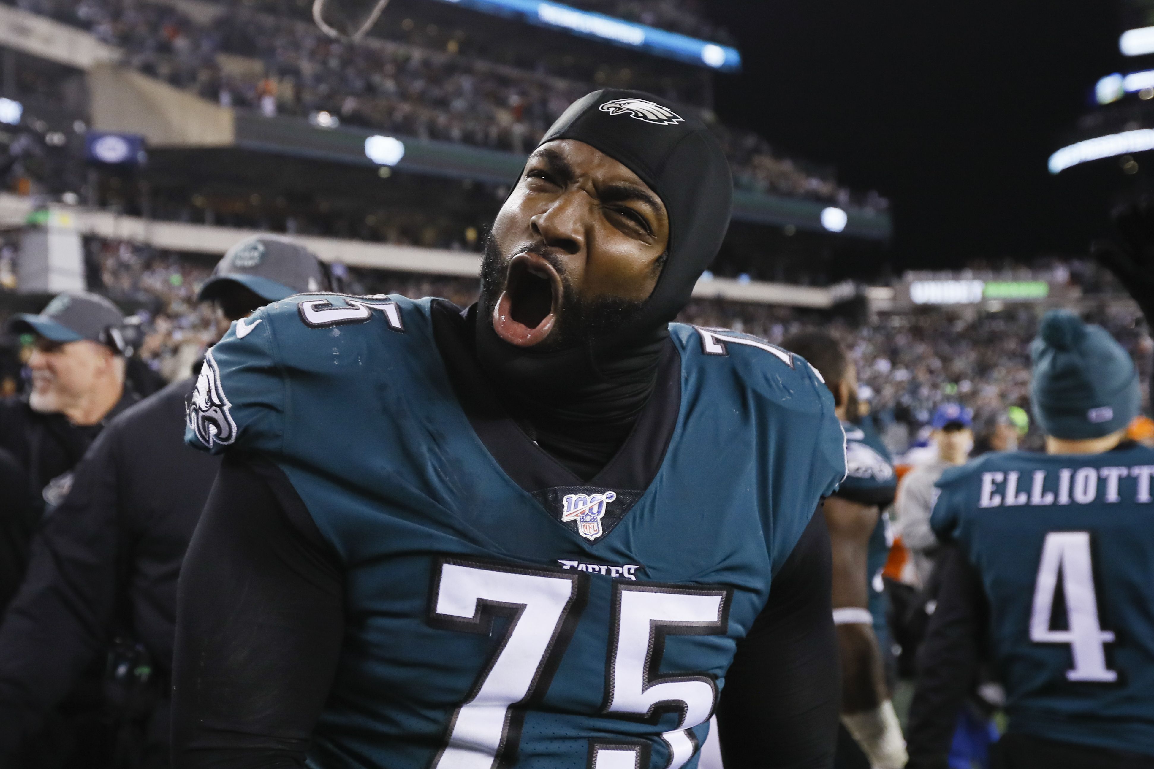 Philadelphia Eagles defensive end Vinny Curry (75) rushes in