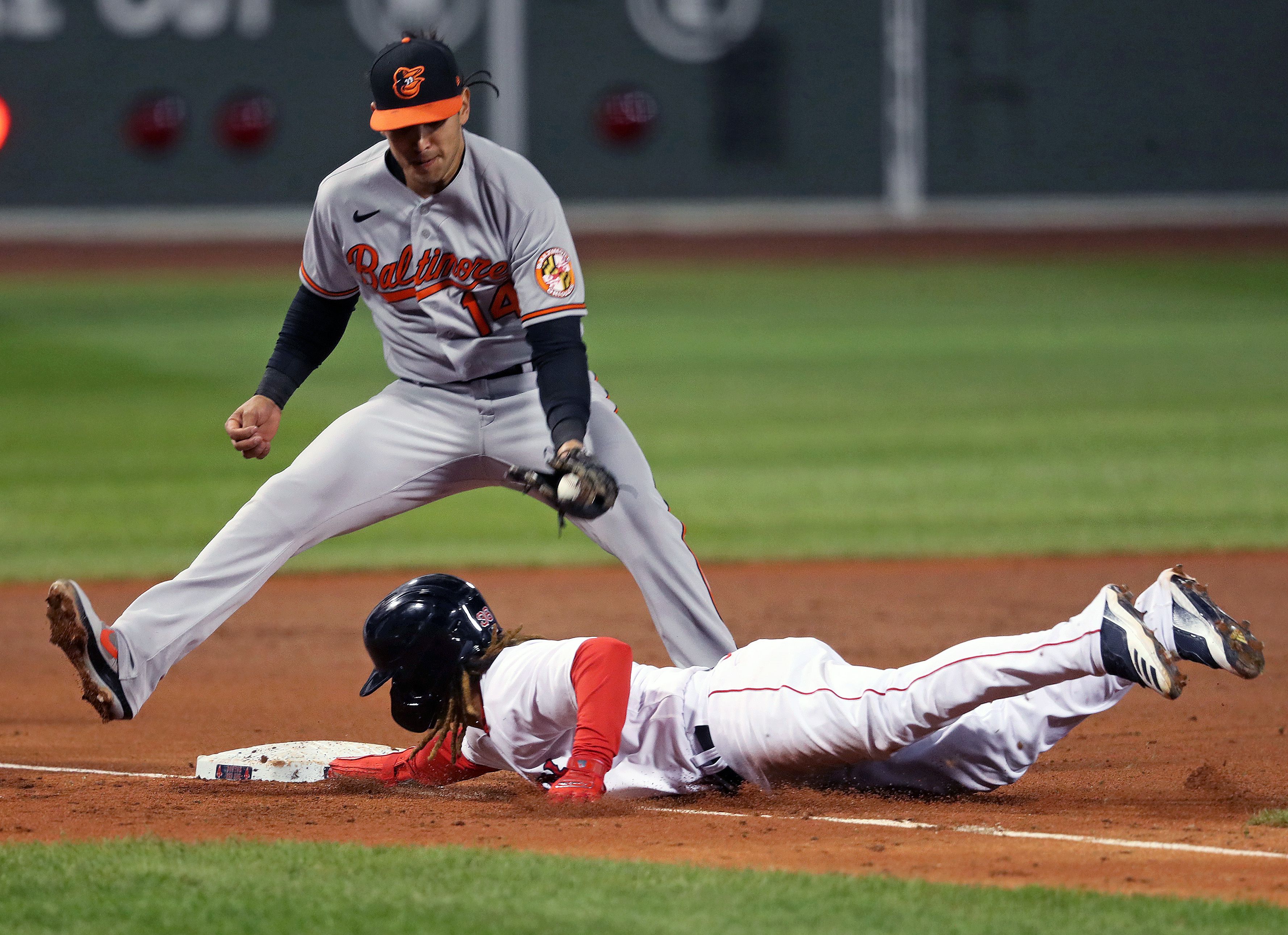 Neither wind, rain delay, nor triple play could derail the Red Sox in a  victory over the National League-leading Braves - The Boston Globe