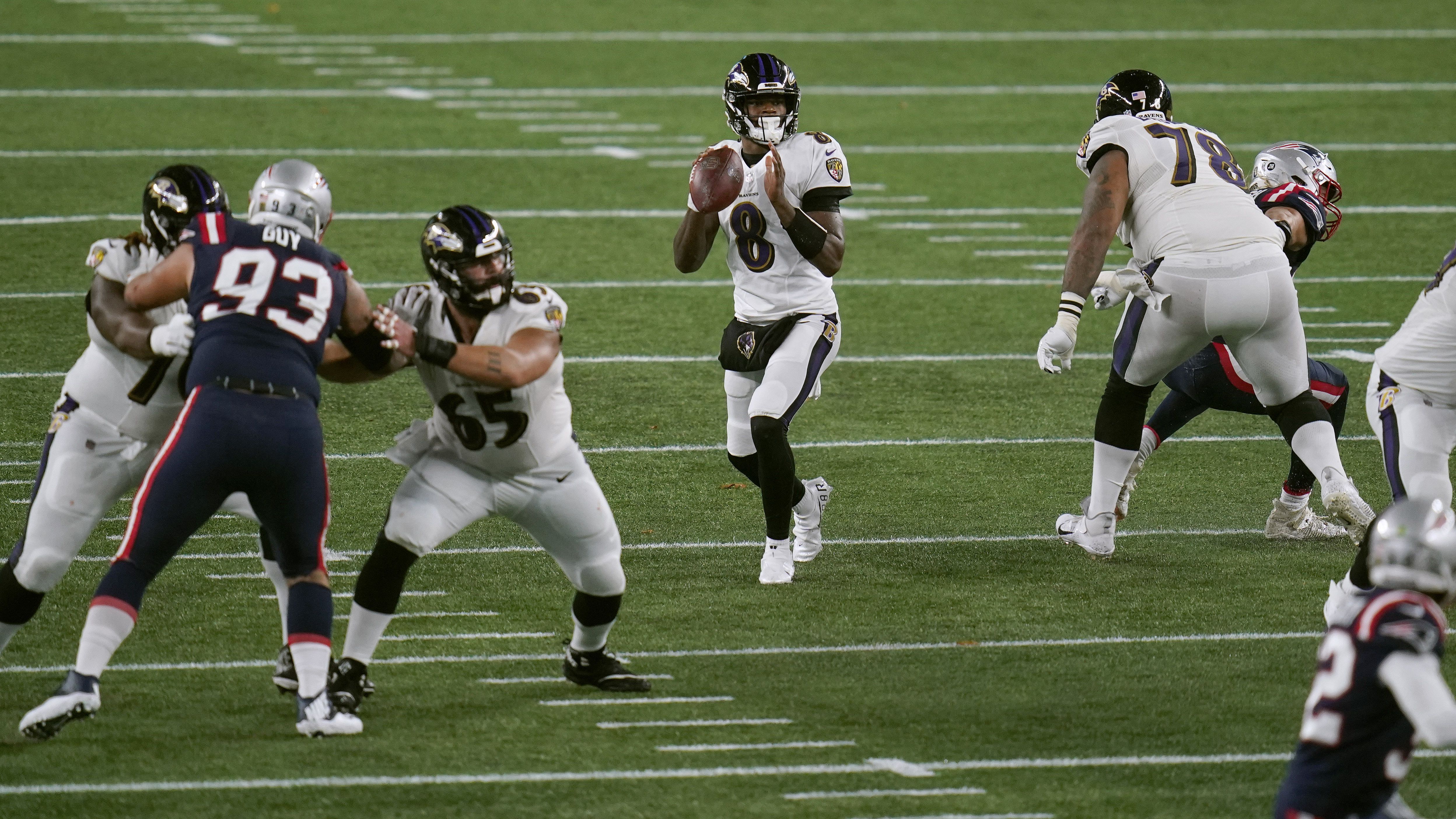 Cam Newton helps Patriots beat Ravens in rain and wind