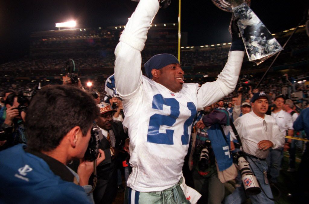 Former Dallas Cowboys players, from left, Michael Irvin, Troy Aikman and  Emmitt Smith were inducted into the Cowboy's Ring of Honor at Texas Stadium  during halftime of the Dallas-Washington game September 19