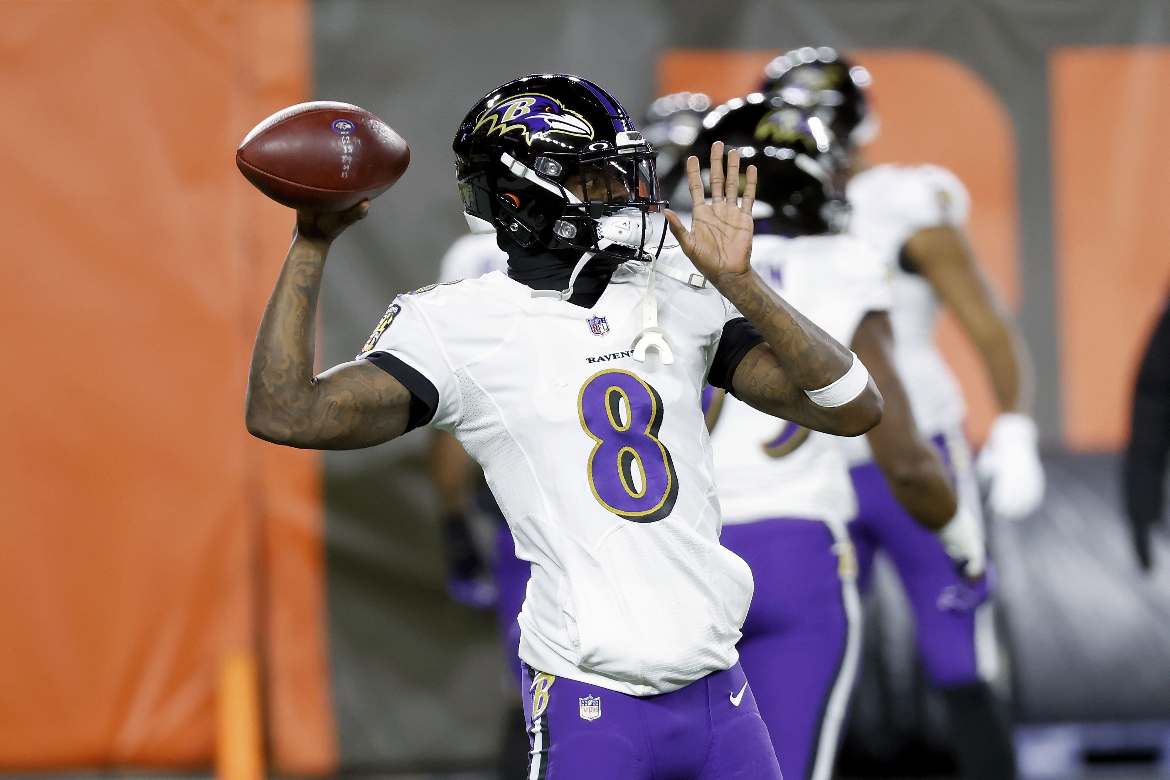 Baltimore Ravens quarterback Lamar Jackson (8) warms up before