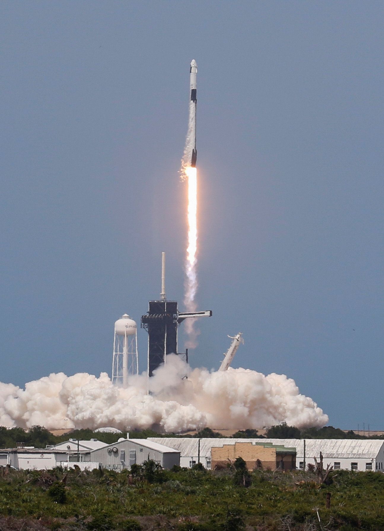 A SpaceX Falcon 9 rocket and Crew Dragon spacecraft carrying NASA astronauts Douglas Hurley and Robert Behnken lifts off during NASA's SpaceX Demo-2 mission to the International Space Station from NASA's Kennedy Space Center in Cape Canaveral