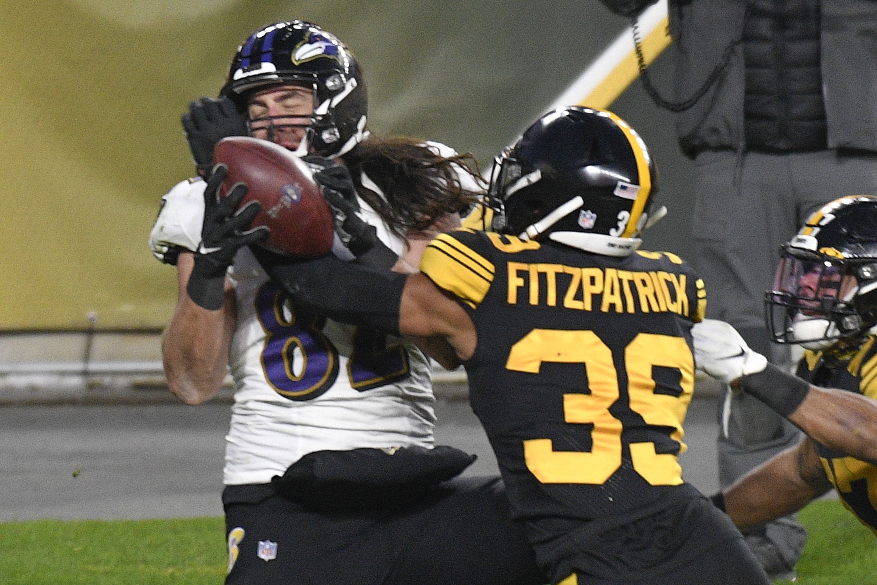 Steelers edge short-handed Ravens to improve to 11-0