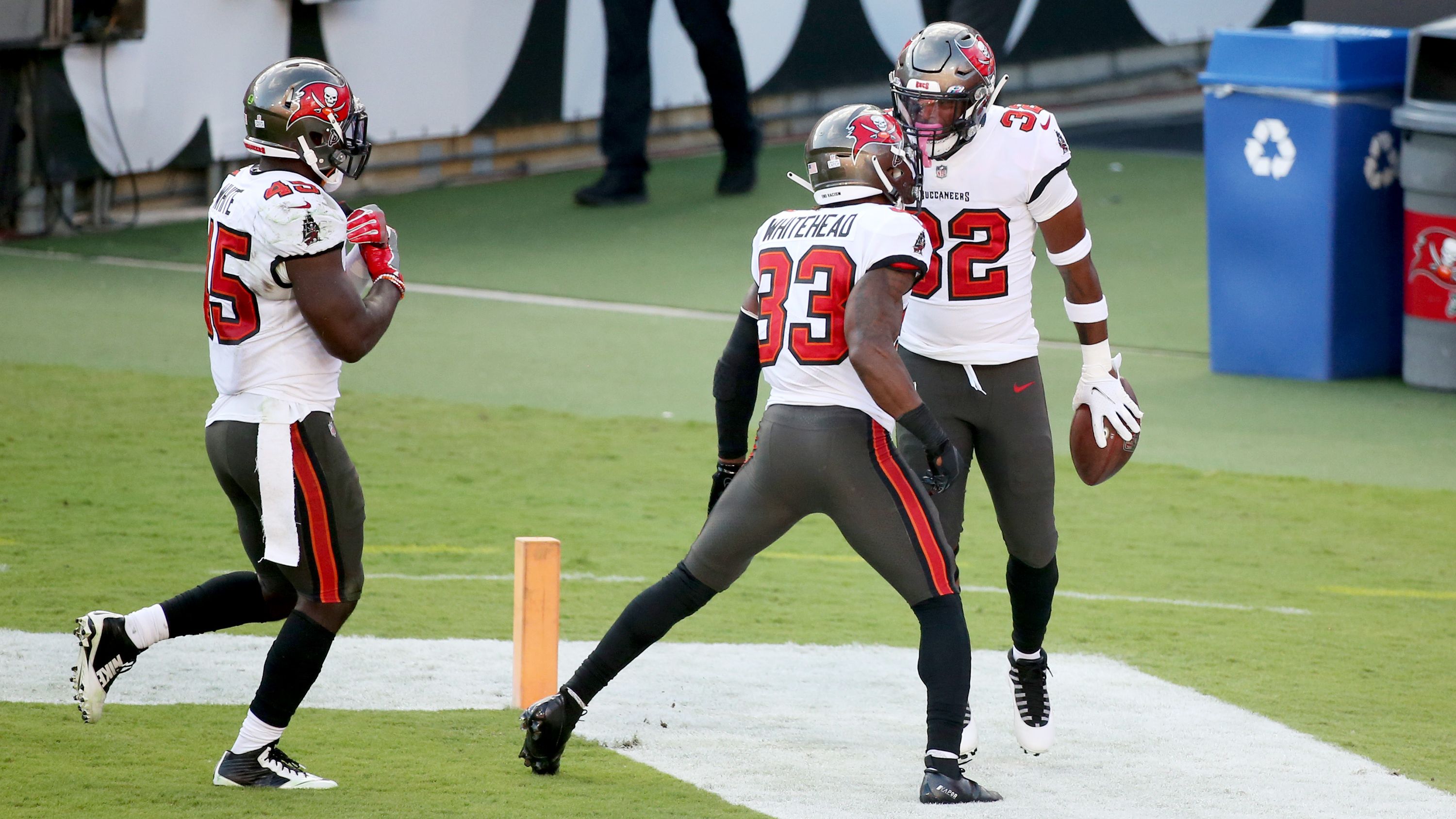 Tampa Bay Buccaneers inside linebacker Devin White (45) and free safety  Jordan Whitehead (33) t …