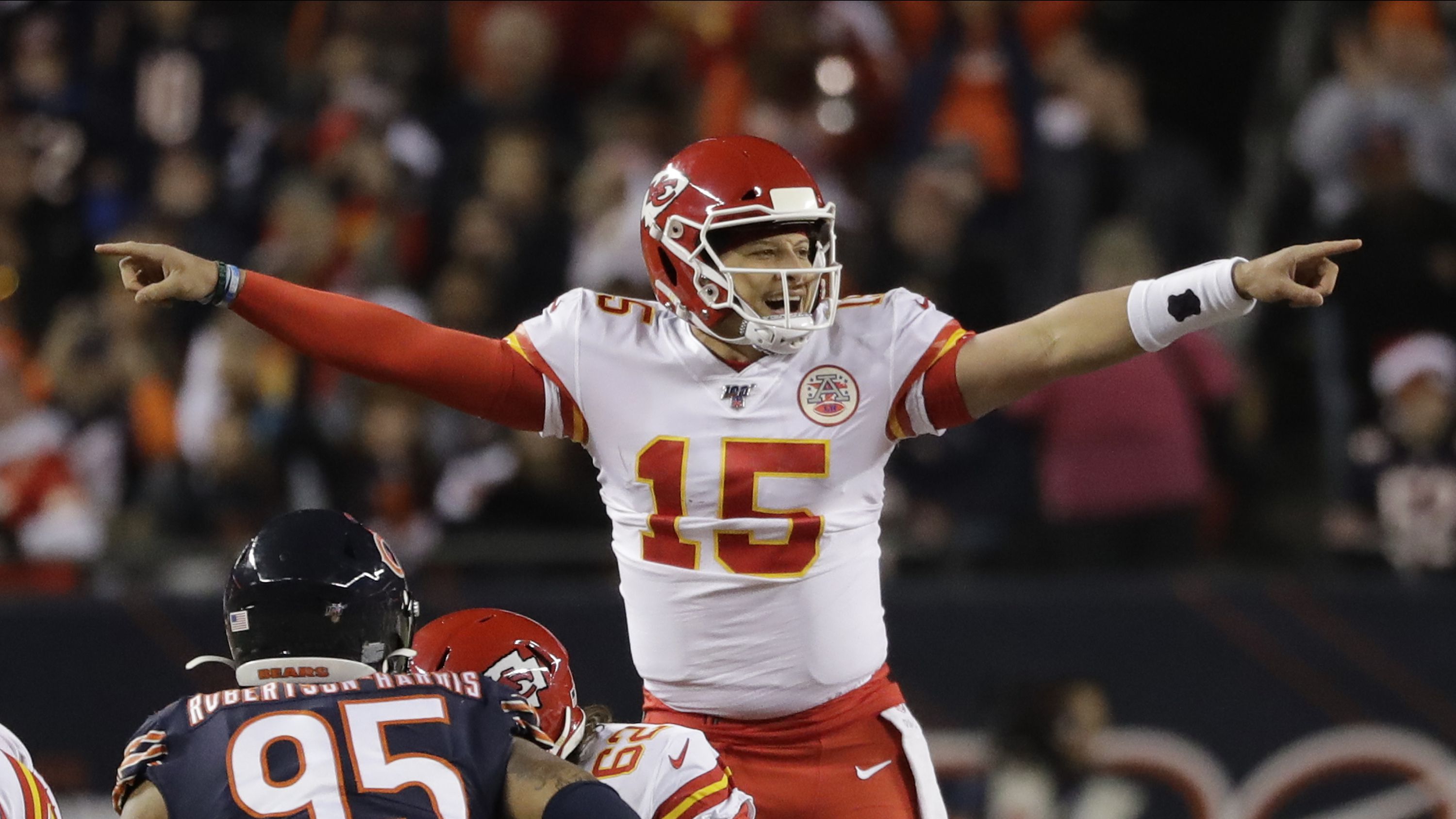 Kansas City Chiefs quarterback Patrick Mahomes (15) runs for a 12-yard  touchdown against the Chicago Bears in the first half of an NFL football  game in Chicago, Sunday, Dec. 22, 2019. (AP