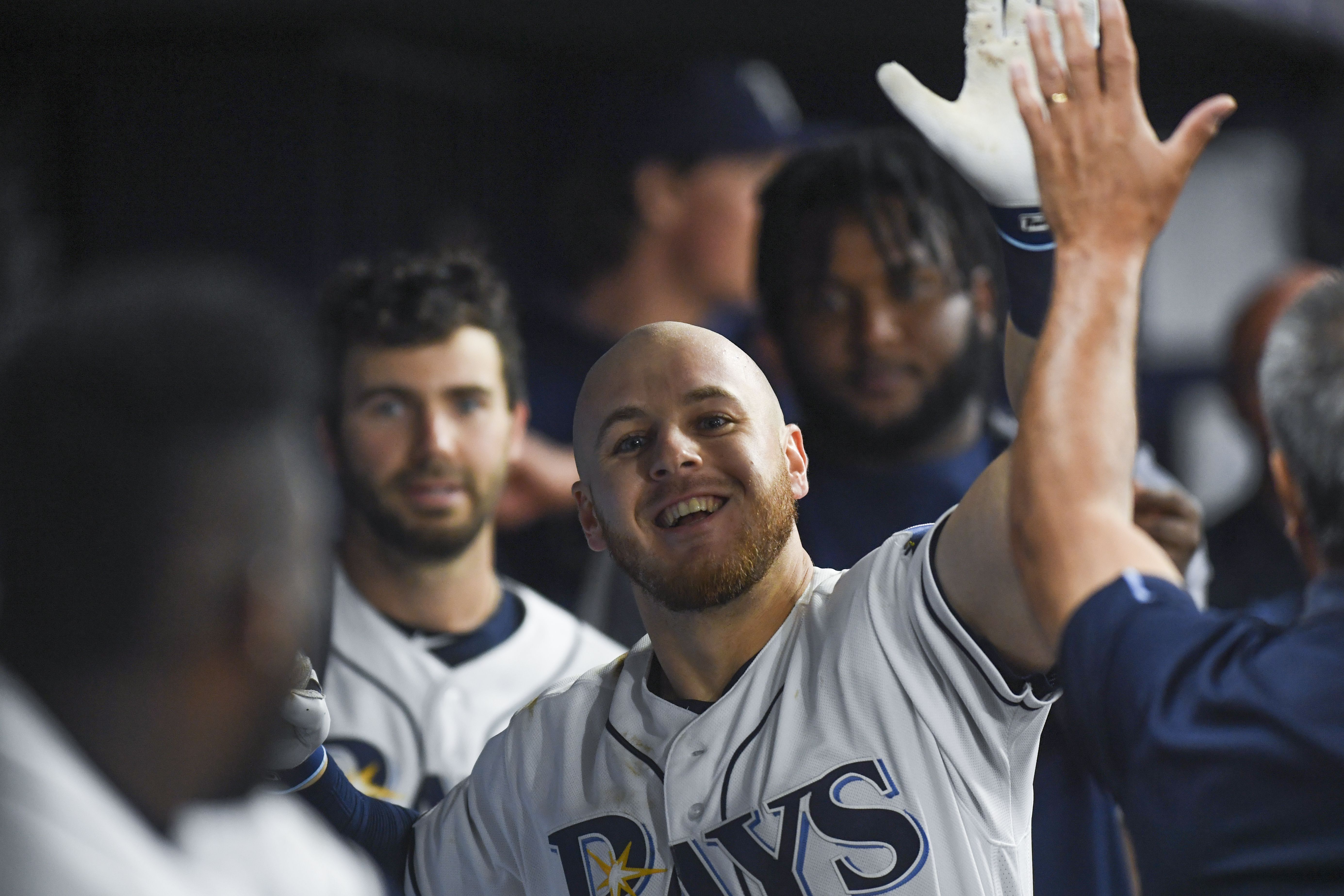 Orioles score six in ninth, hold on to beat Rays 9-6