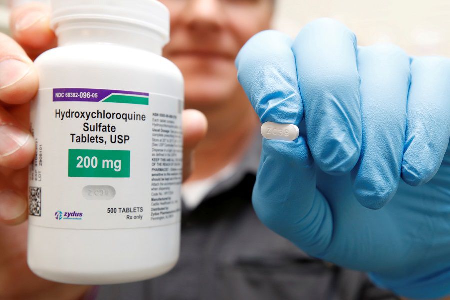 FILE PHOTO: The drug hydroxychloroquine, pushed by U.S. President Donald Trump and others in recent months as a possible treatment to people infected with the coronavirus disease (COVID-19), is displayed by a pharmacist in Provo