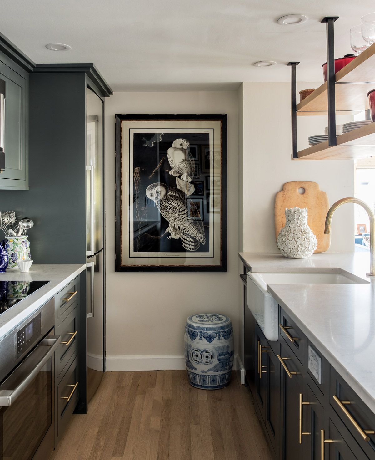 An uncluttered kitchen in a green Somerville condo - The Boston Globe