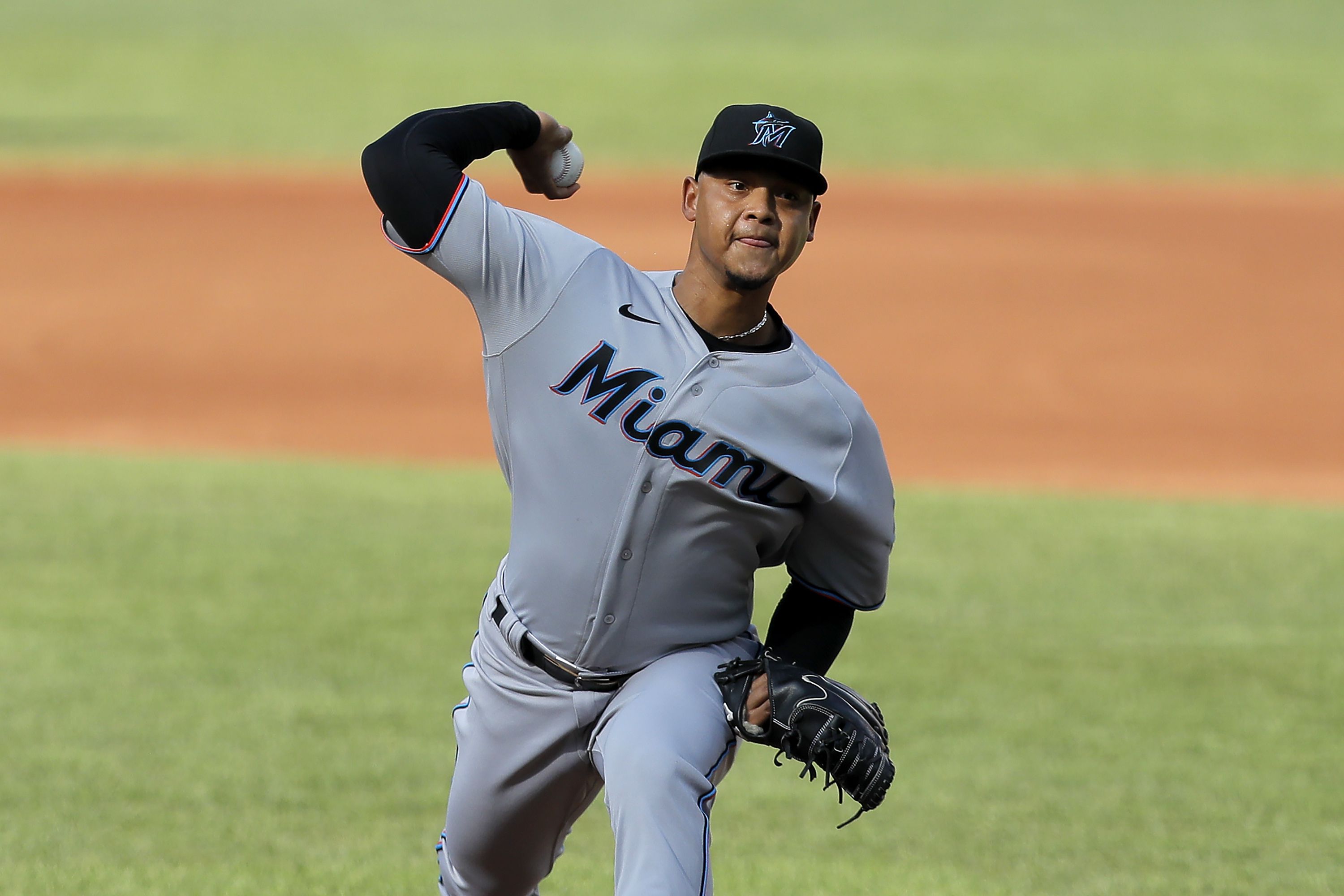 Miami Marlins shortstop Jose Iglesias throws to first during a