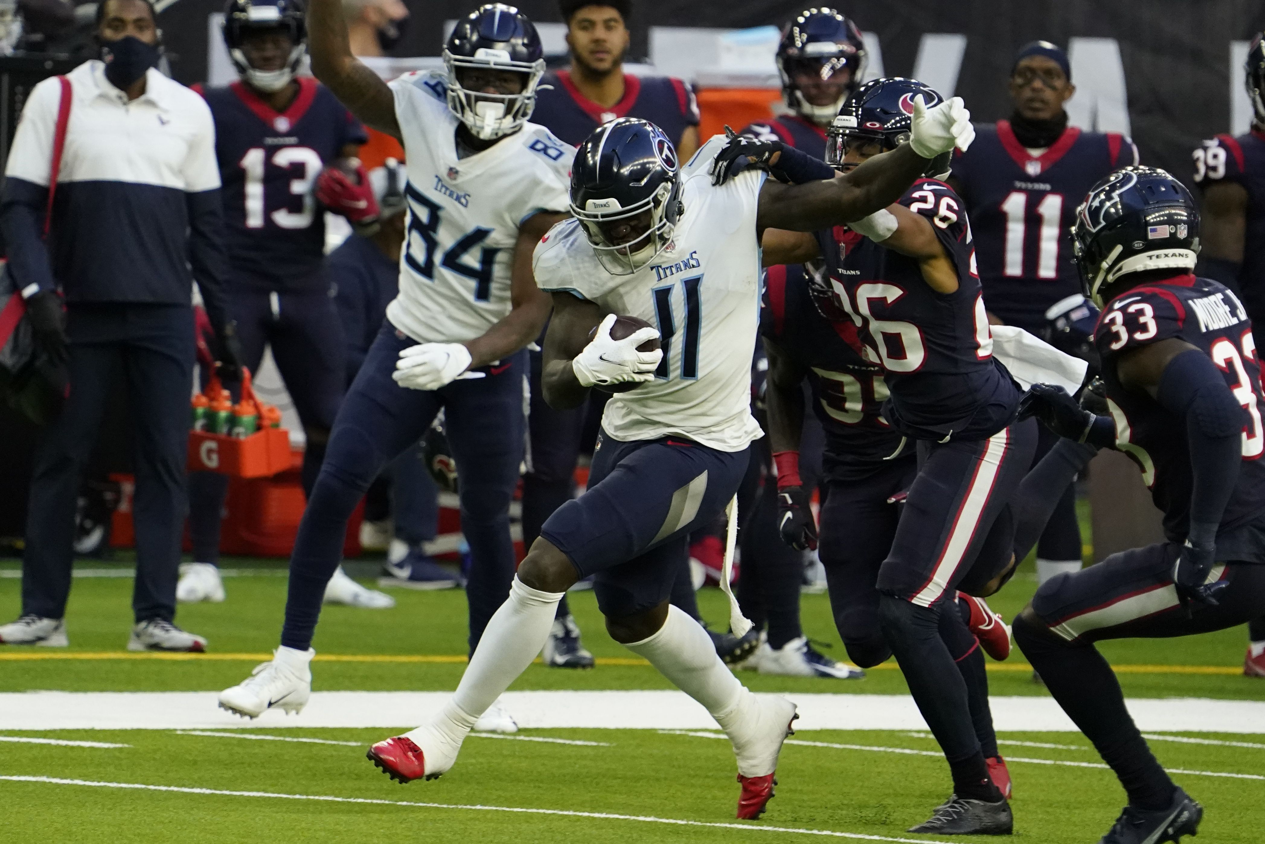 Photos: Titans kicker Sam Sloman kicks Titans to AFC South title