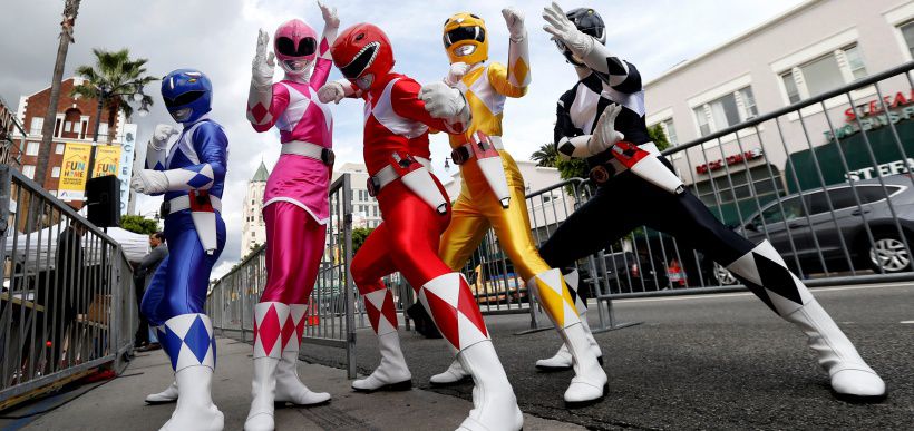 People dressed like the characters of Power Rangers pose at the unveiling of the star for Israeli-American producer Haim Saban on the Hollywood Walk of Fame in Los Angeles