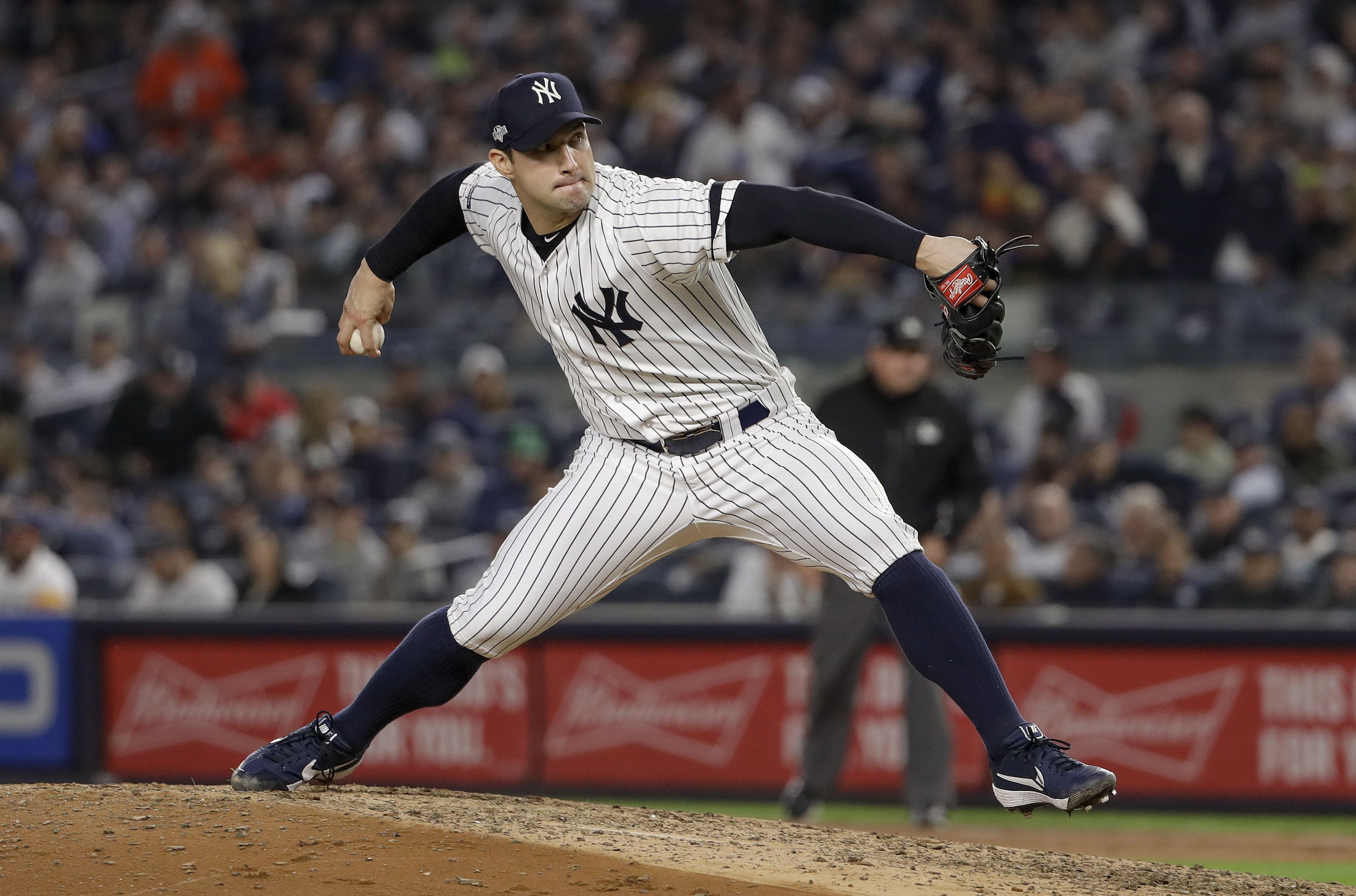 New York Yankees' Lance Lynn delivers a pitch during the first inning of a  baseball game against the Toronto Blue Jays, Friday, Aug. 17, 2018, in New  York. (AP Photo/Frank Franklin II