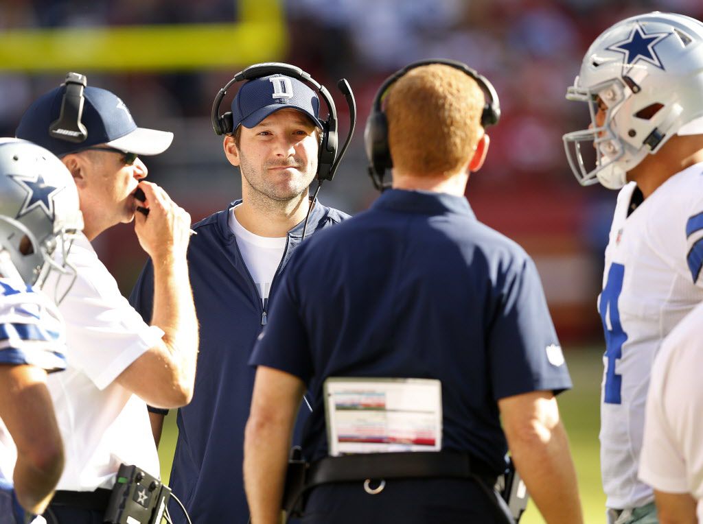 Photo: Dallas Cowboys Tony Romo stands on the sidelines with head coach  Jason Garrett at MetLife Stadium in New Jersey - NYP20120101102 