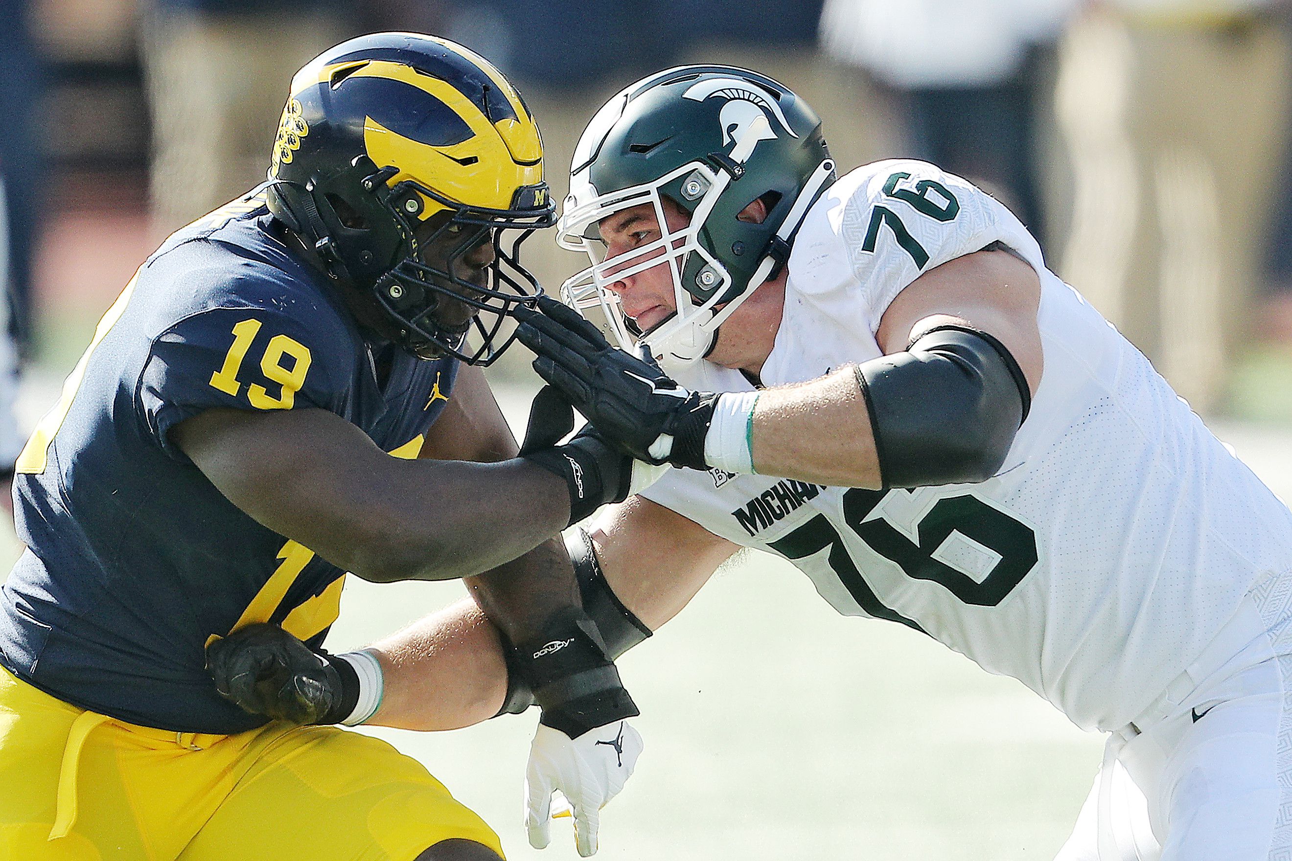 Michigan's Brad Hawkins, Vincent Gray, Donovan Jeter sign with NFL