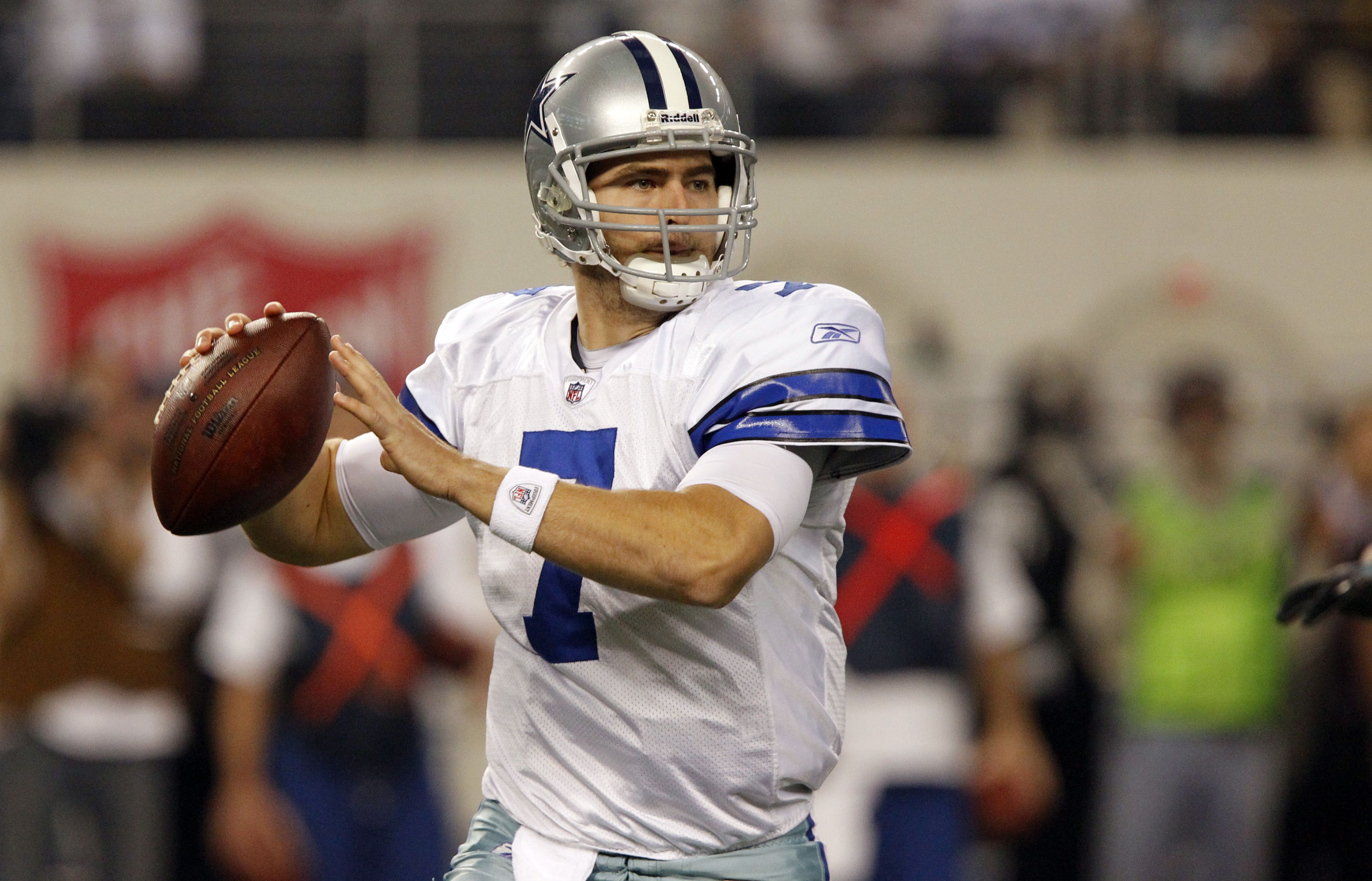 Dallas Cowboys quarterback Stephen McGee (7) tries to take the ball down  field in the first half of their pre-season footbal…