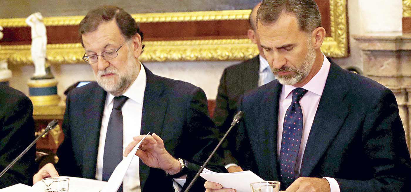 Rey Felipe y Mariano Rajoy