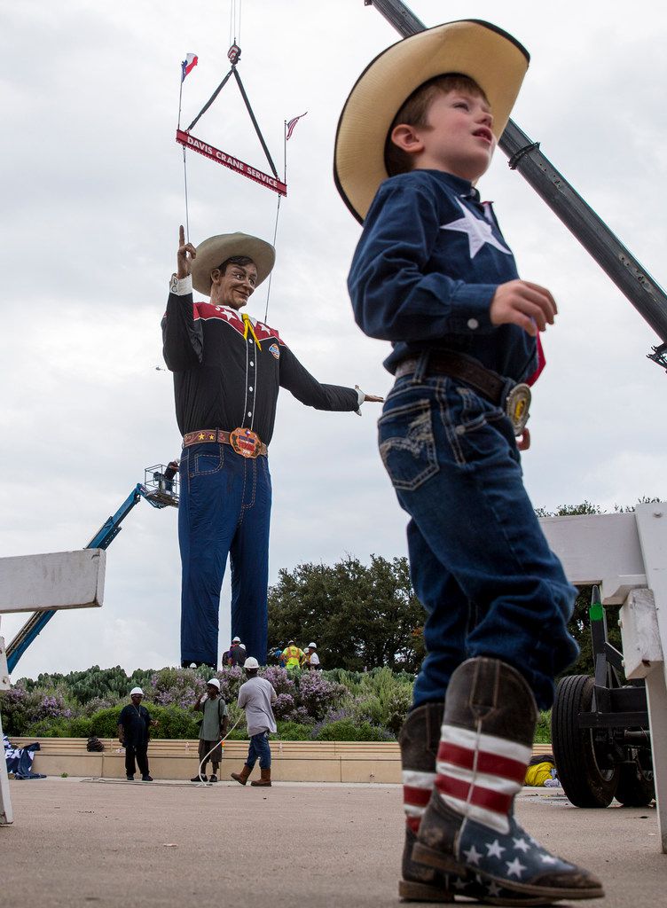 A junior Big Tex upstages the real thing as giant cowboy goes up a