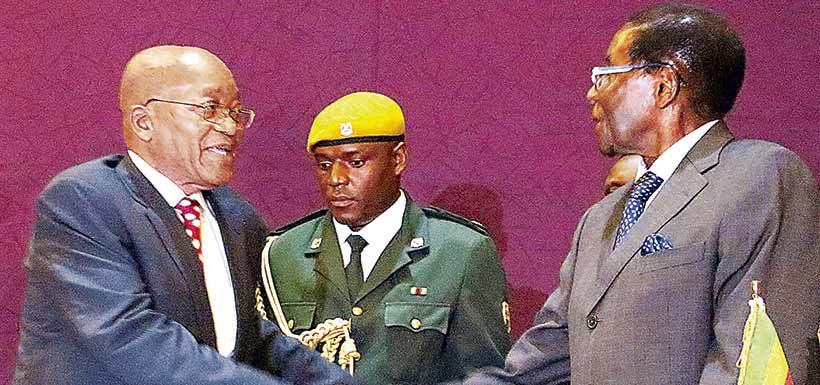 Jacob Zuma y Robert Mugabe