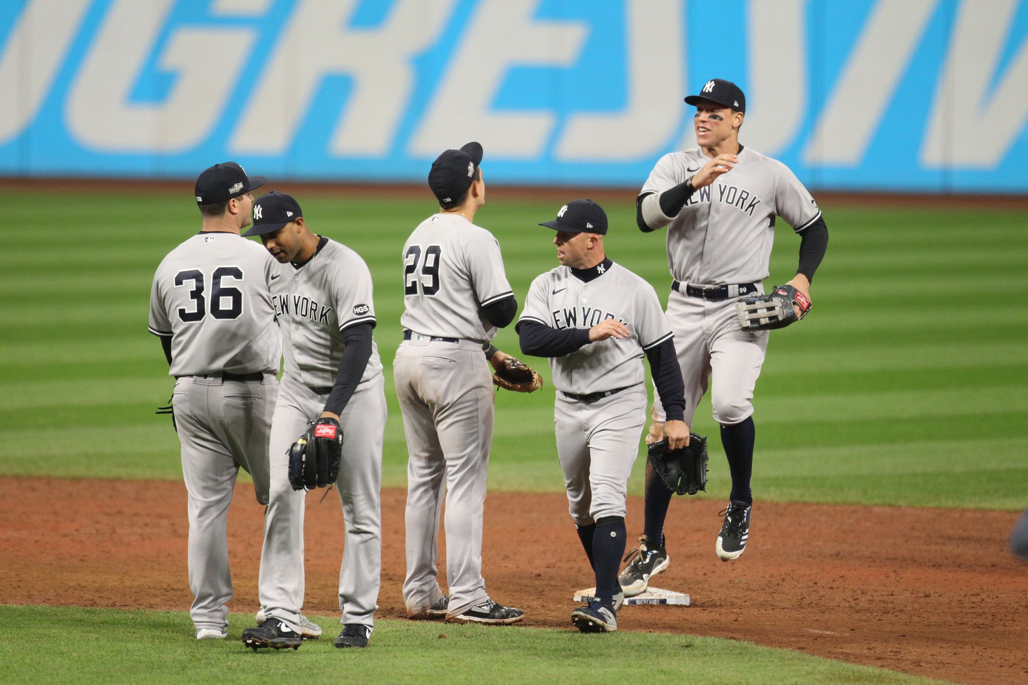 New York Yankees starting pitcher CC Sabathia wipes his face on