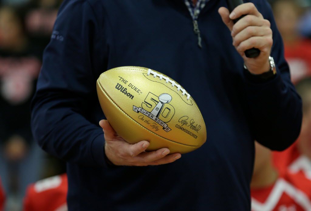 Boomer Esiason Delivers a Golden Football To His HS