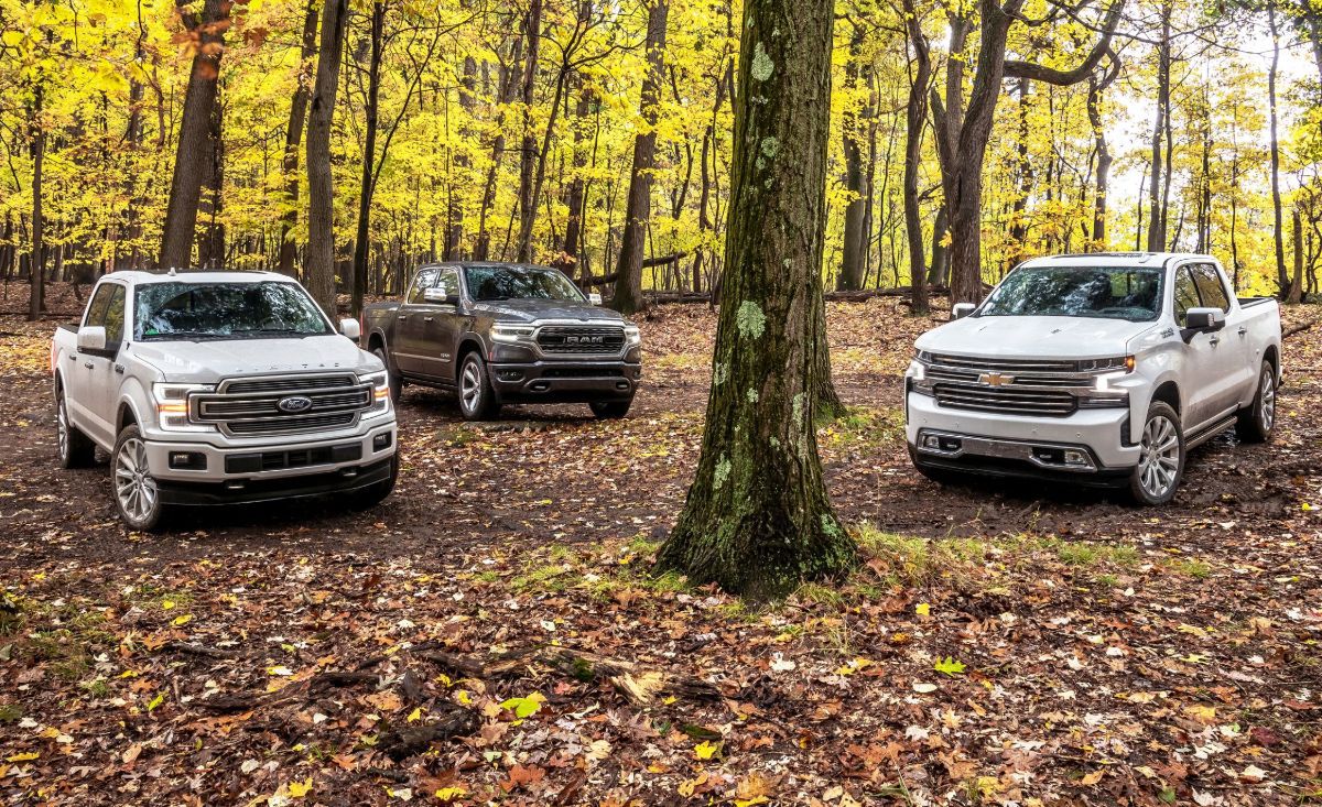 2019-chevrolet-silverado-1500-high-country-vs-ford-f-150-limited-vs-ram-1500-limited-comparison-lead-1545342290.jpg