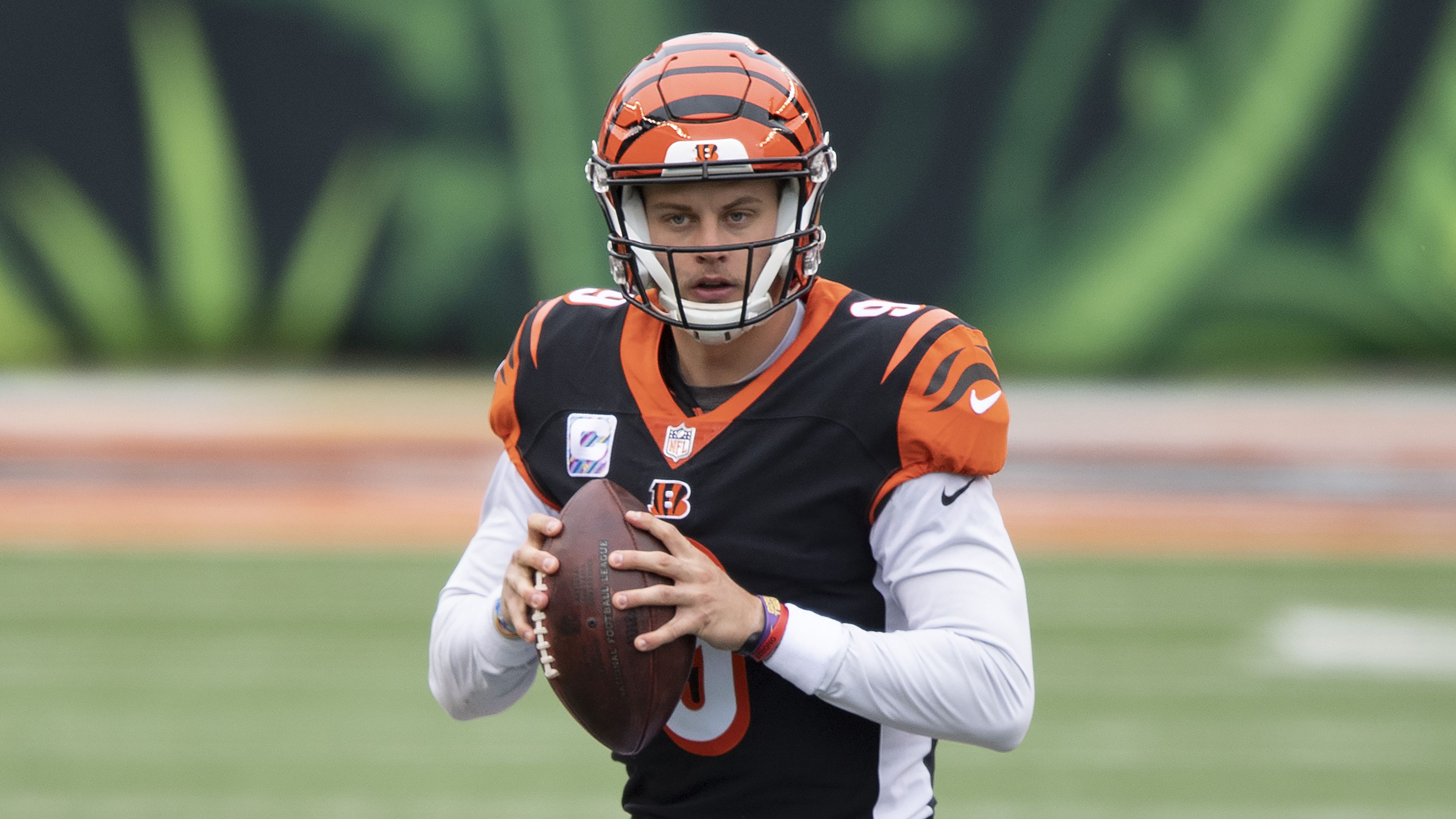 Cincinnati Bengals quarterback Joe Burrow (9) drops back to pass