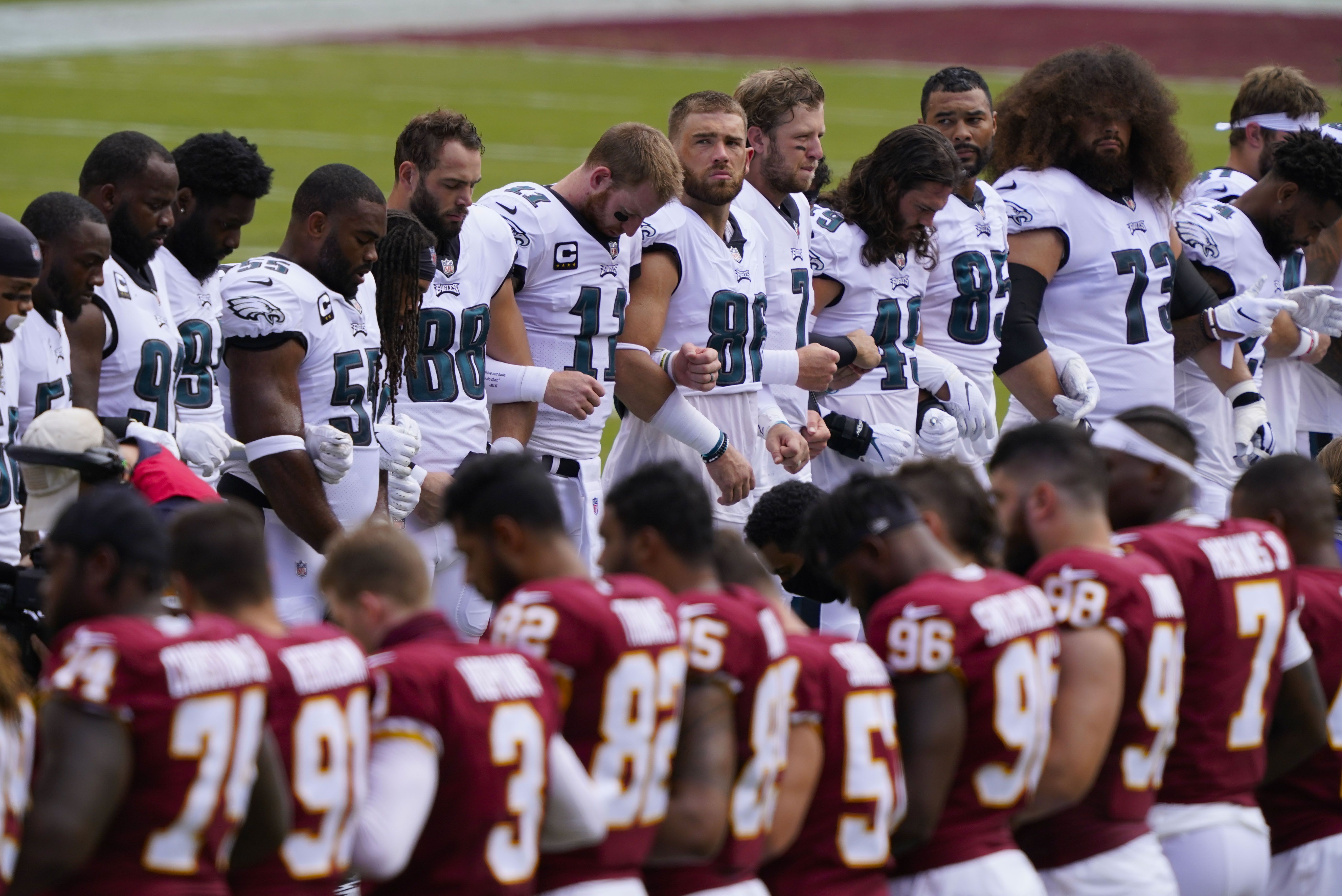 Philadelphia Eagles remain in locker room during national anthem after  pregame show of unity with Washington 