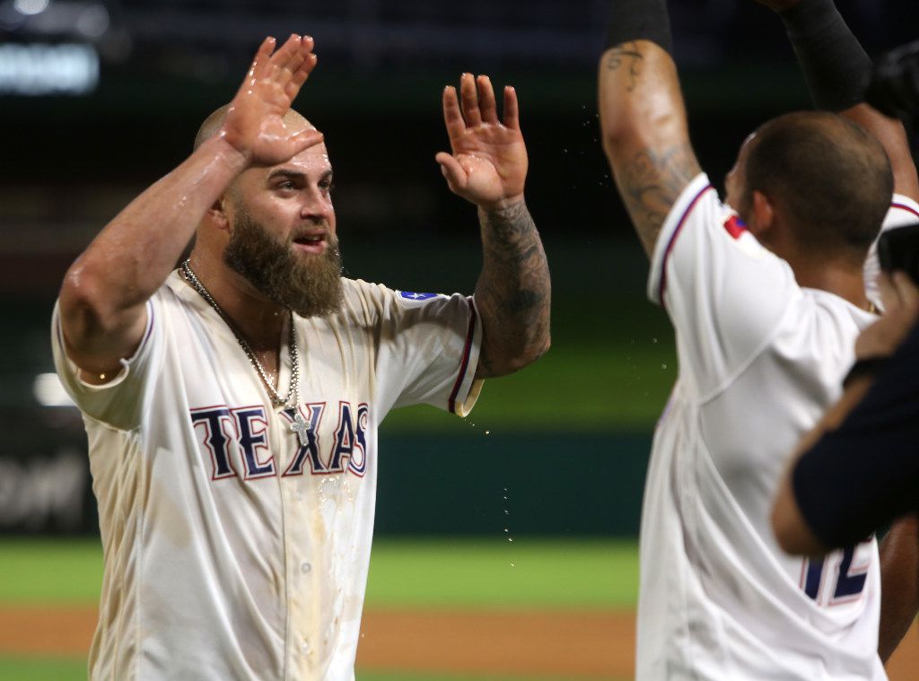 Jun 22, 2017: Texas Rangers second baseman Rougned Odor #12 and Texas  Rangers first baseman Mike Napoli #5 softly butt heads jokingly before an  MLB game between the Toronto Blue Jays and