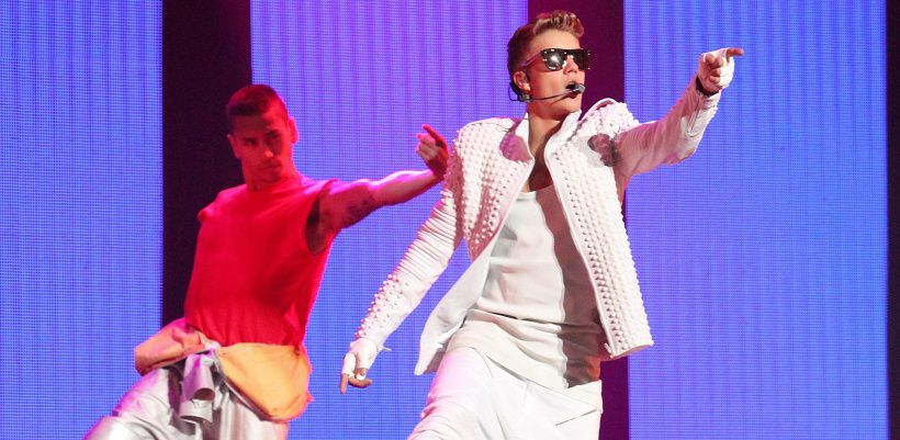 FILE PHOTO - Canadian pop singer Bieber performs during his world tour concert in Beijing