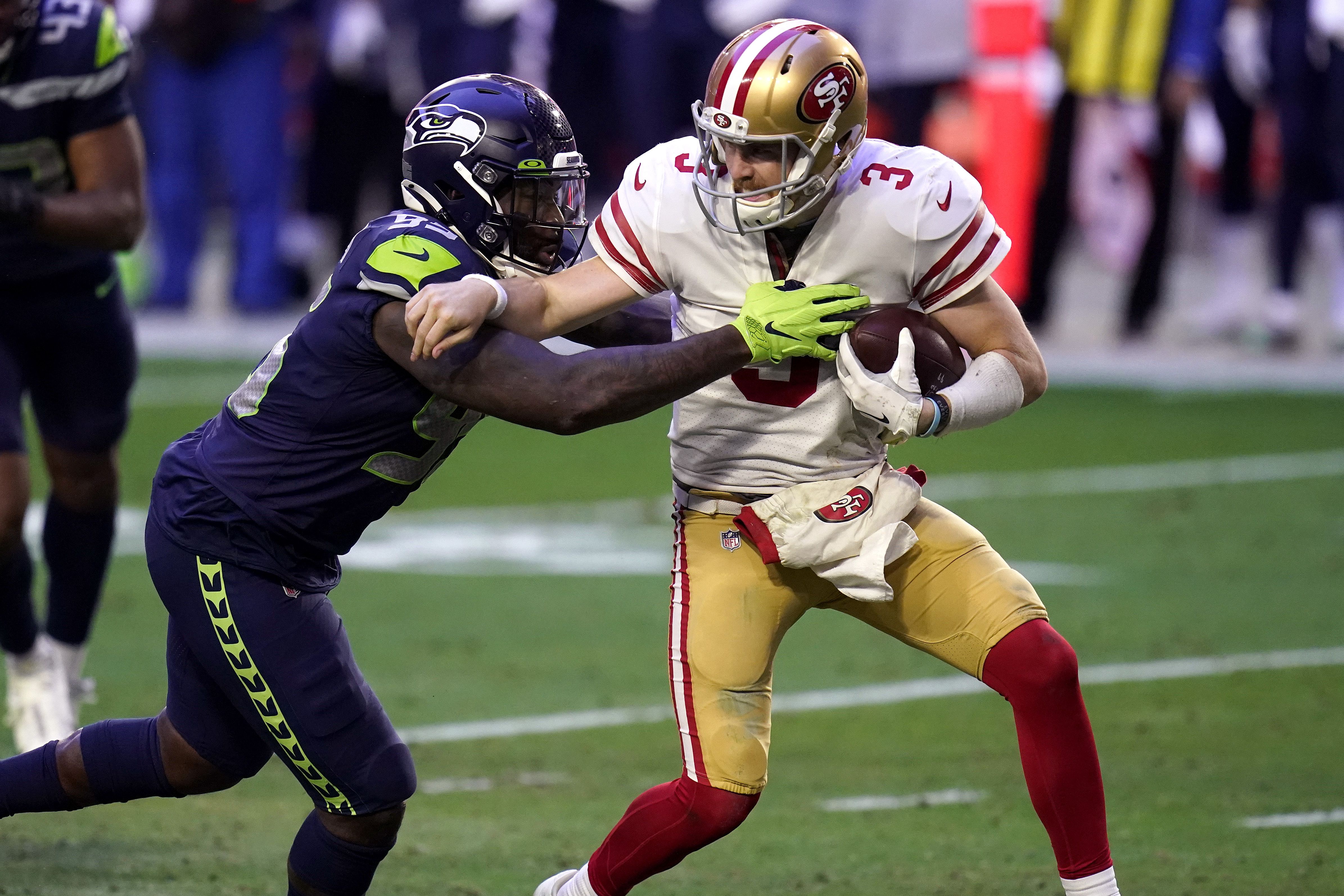 Russell Wilson, Tyler Lockett help Seahawks rally late for 26-23