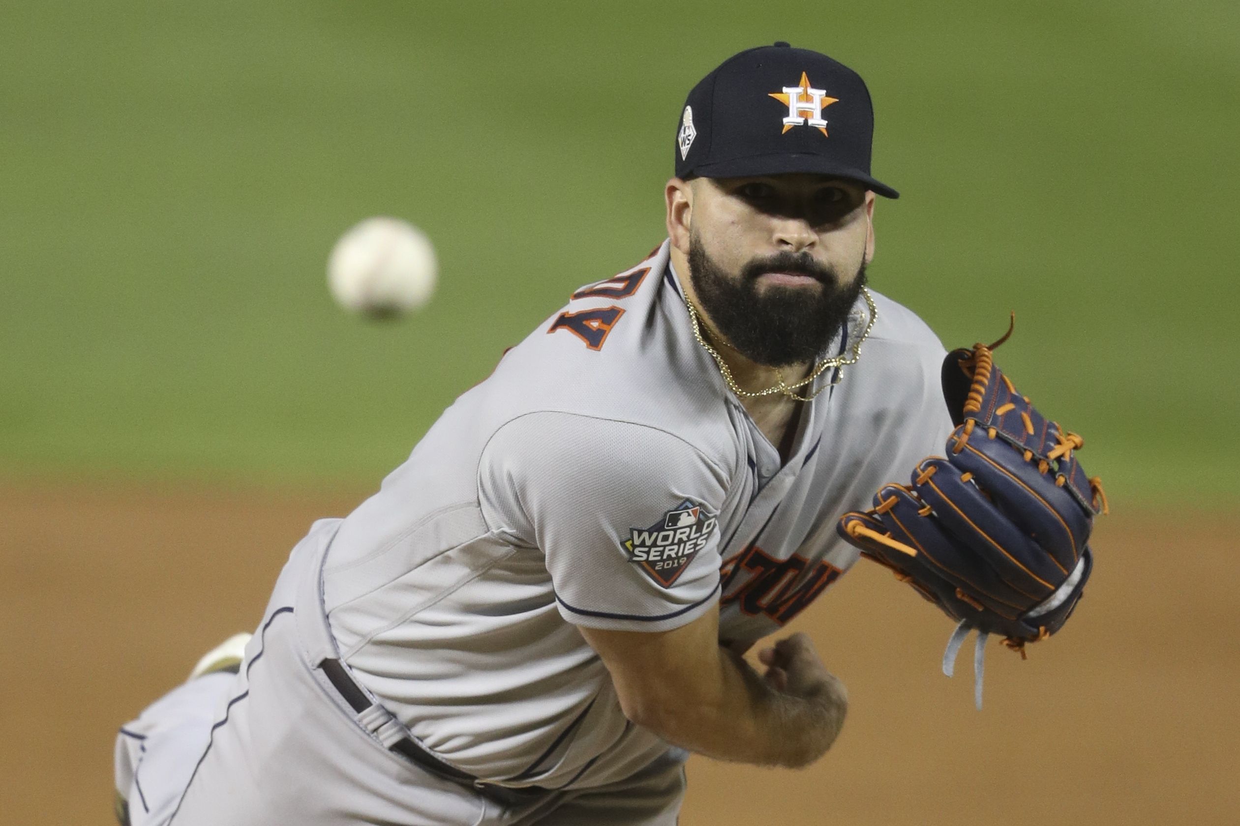 Astros flex muscles and rally past Dodgers to square series