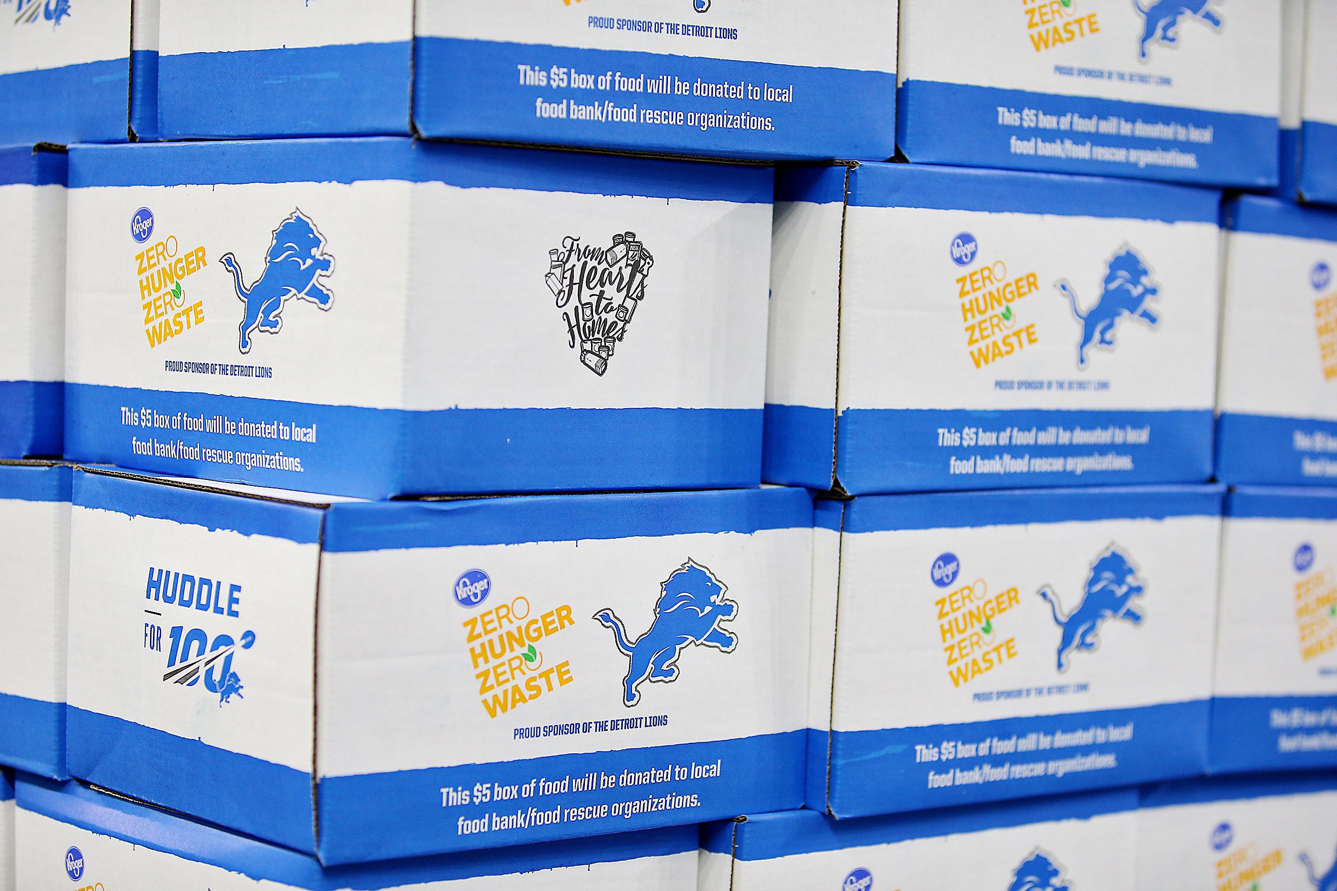 Lions owner Martha Ford, Barry Sanders help pack 50K food boxes for  Michigan families in need 