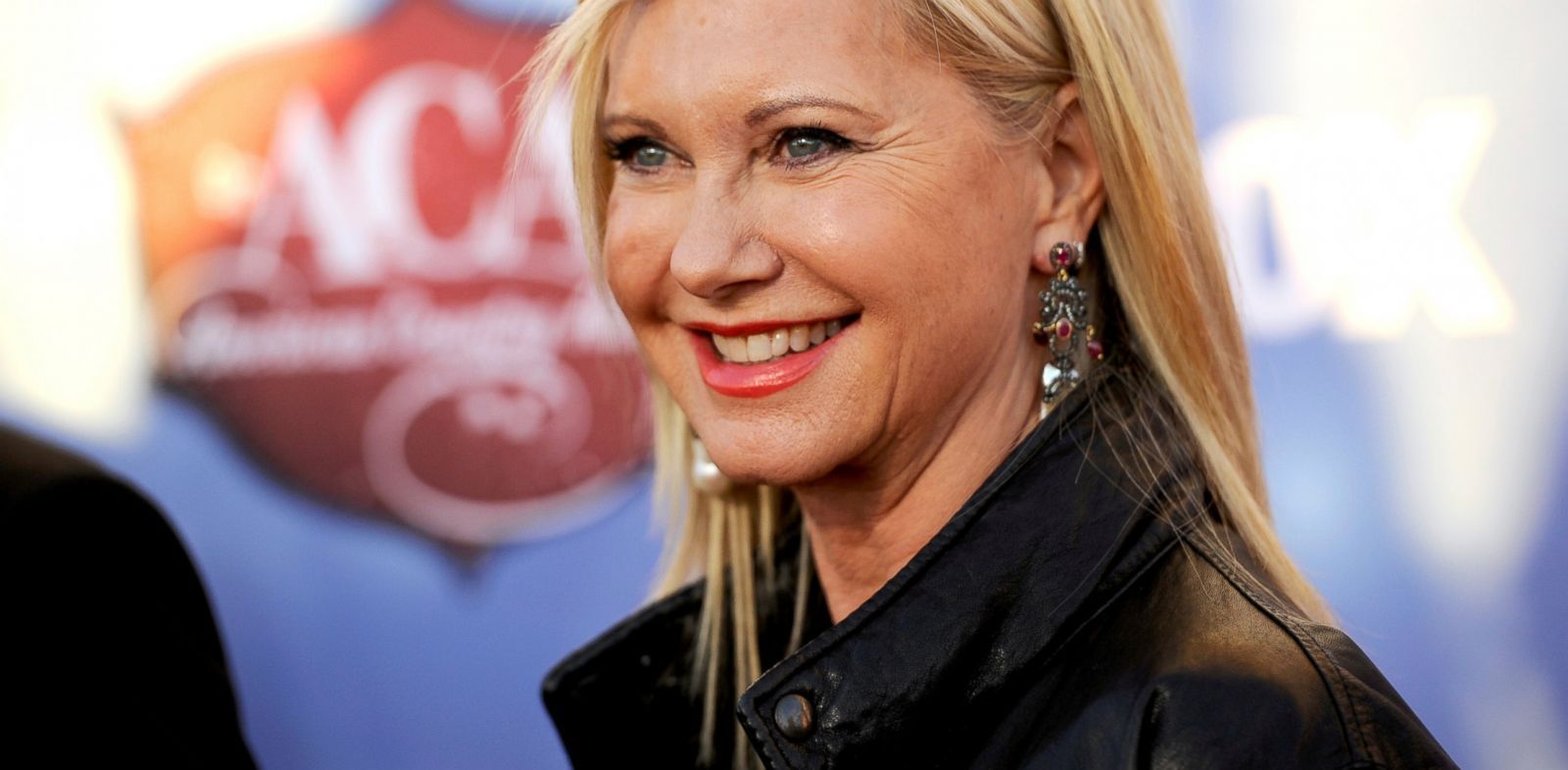 AP_Olivia_newton_john_ml_140205_33x16_1600