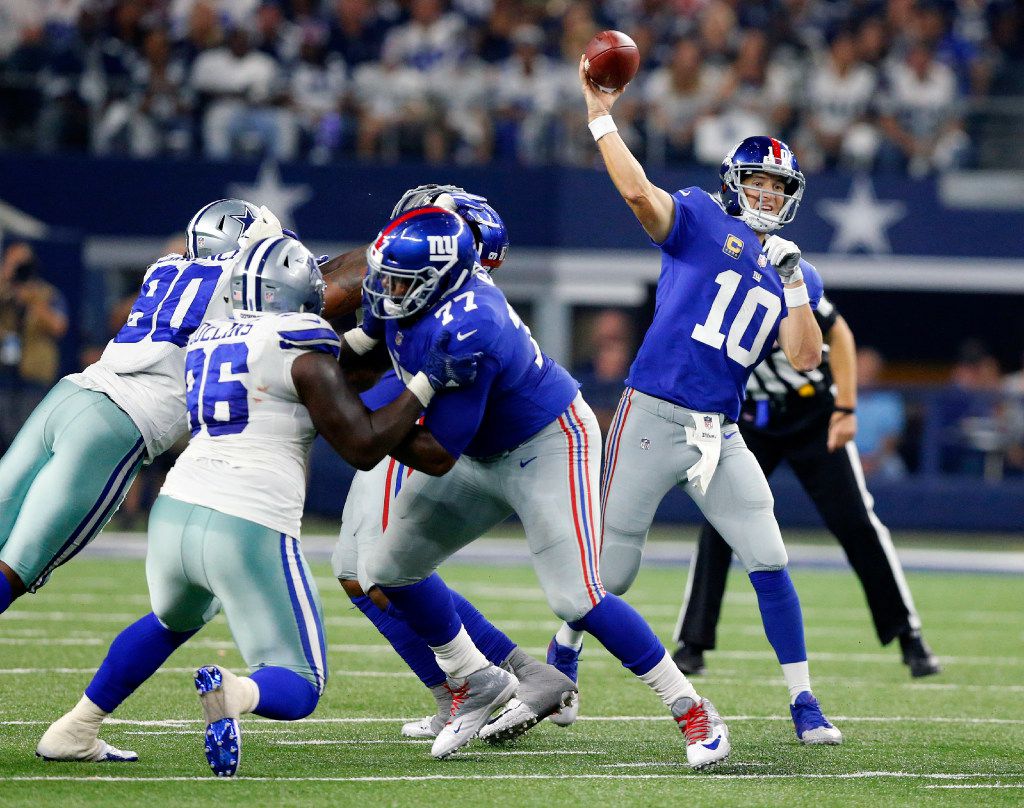 New York Giants quarterback Eli Manning releases a pass in the