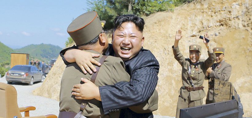 north-korean-leader-kim-jong-un-reacts-with-38312258