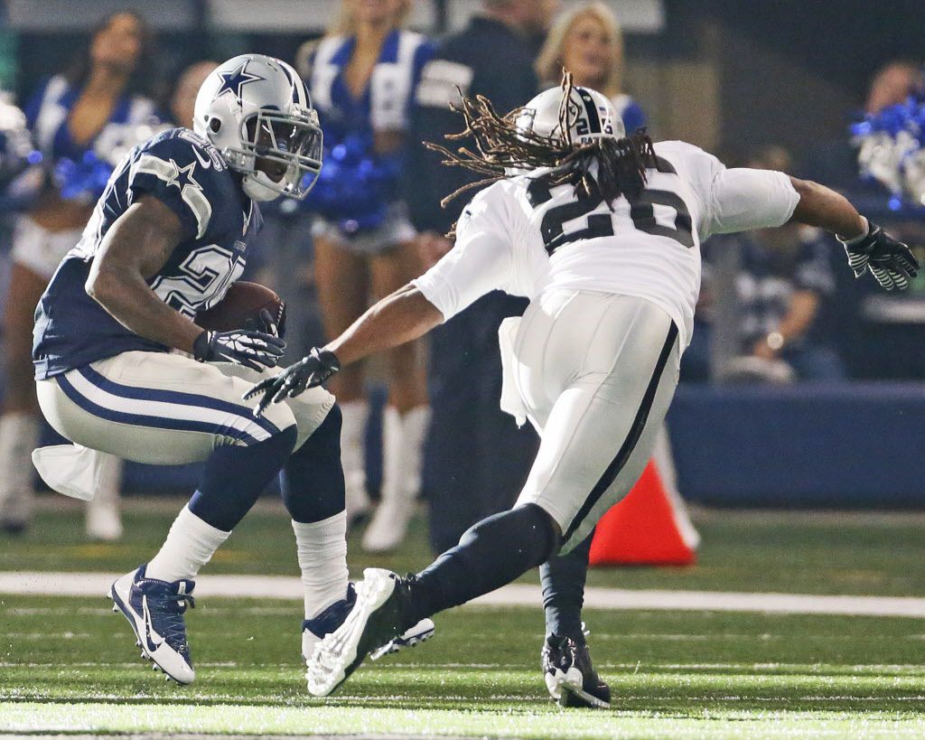 Oakland Raiders free safety Usama Young (26) leaves the field with