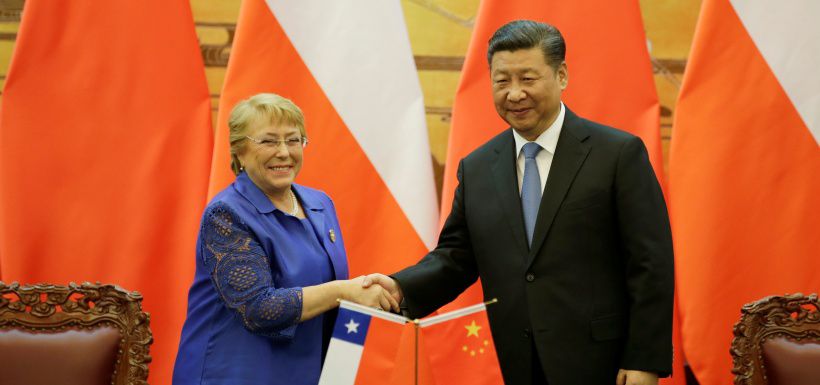 Chilean President Michelle Bachelet and Chinese President Xi Jinping attend a signing ceremony in Beijing