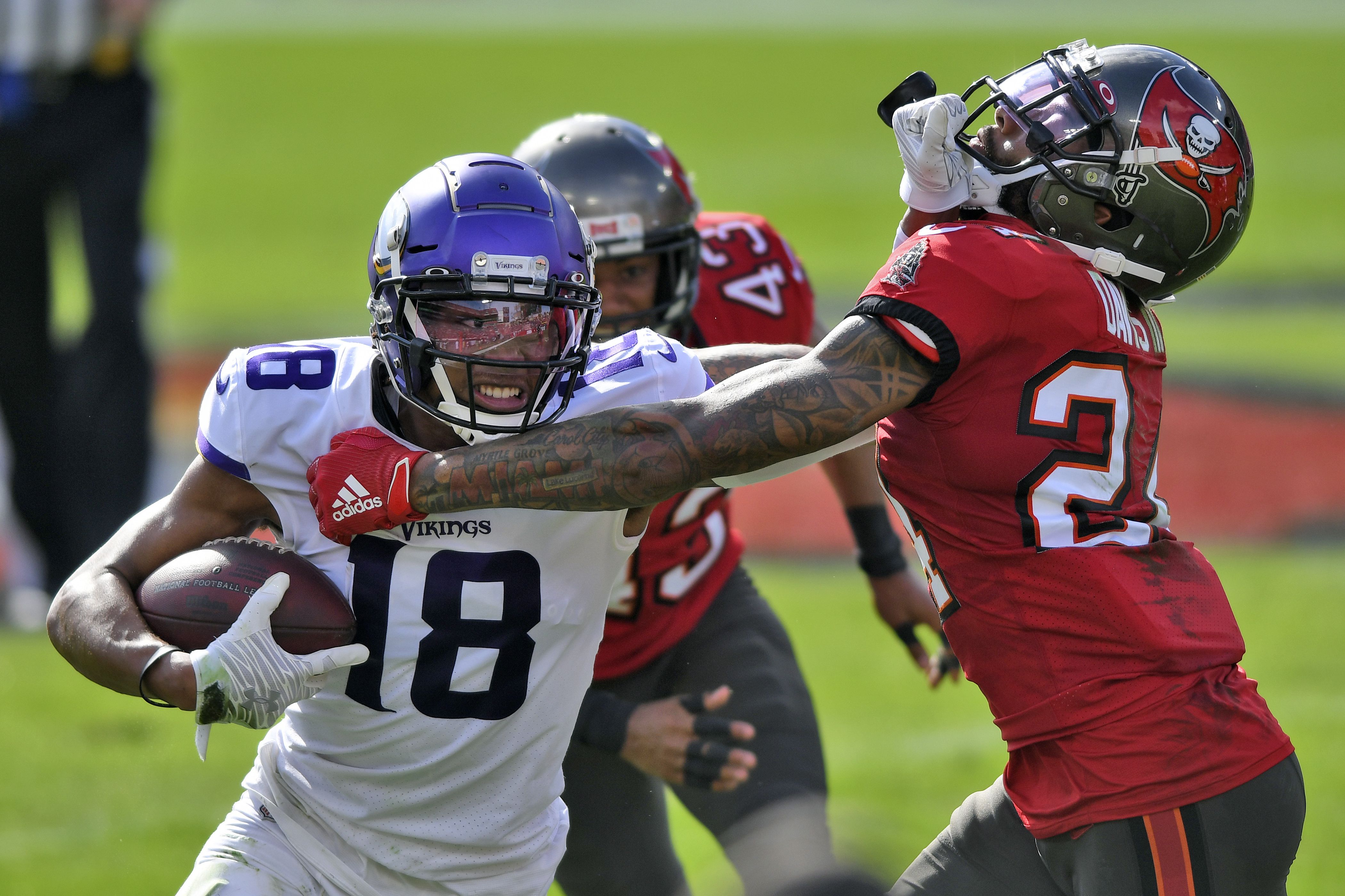 Minnesota Vikings fullback C.J. Ham (30) celebrates after his touchdown  with offensive tackle Brian O'Neill, right, in the second half of an NFL  football game against the Buffalo Bills, Sunday, Nov. 13