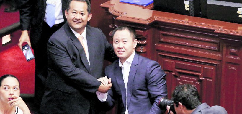 congressman-fujimori-shakes-hands-with-a-fe-40283602