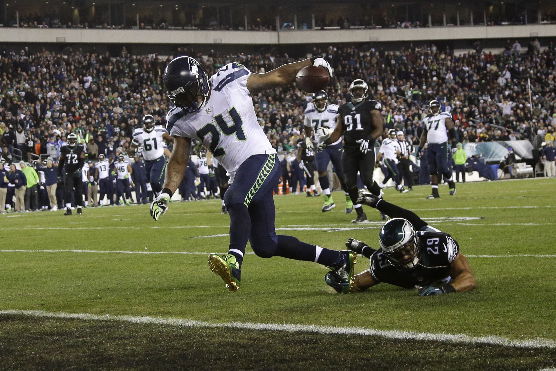 Seattle Seahawks' Marshawn Lynch (24) scores a touchdown on a 1-yard rush  against the San Franc …