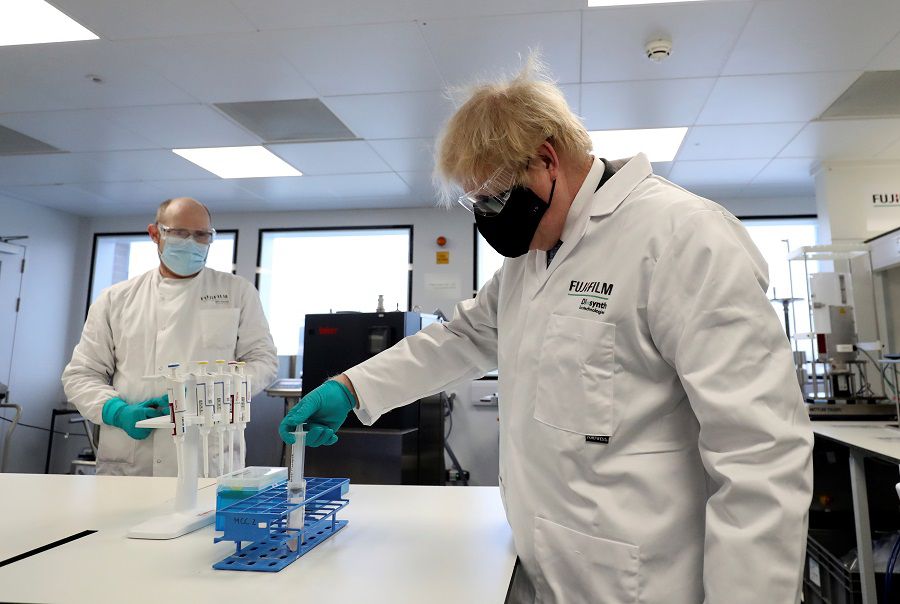 Britain's Prime Minister Boris Johnson visits a pharmaceutical manufacturing facility in Stockton-on-Tees